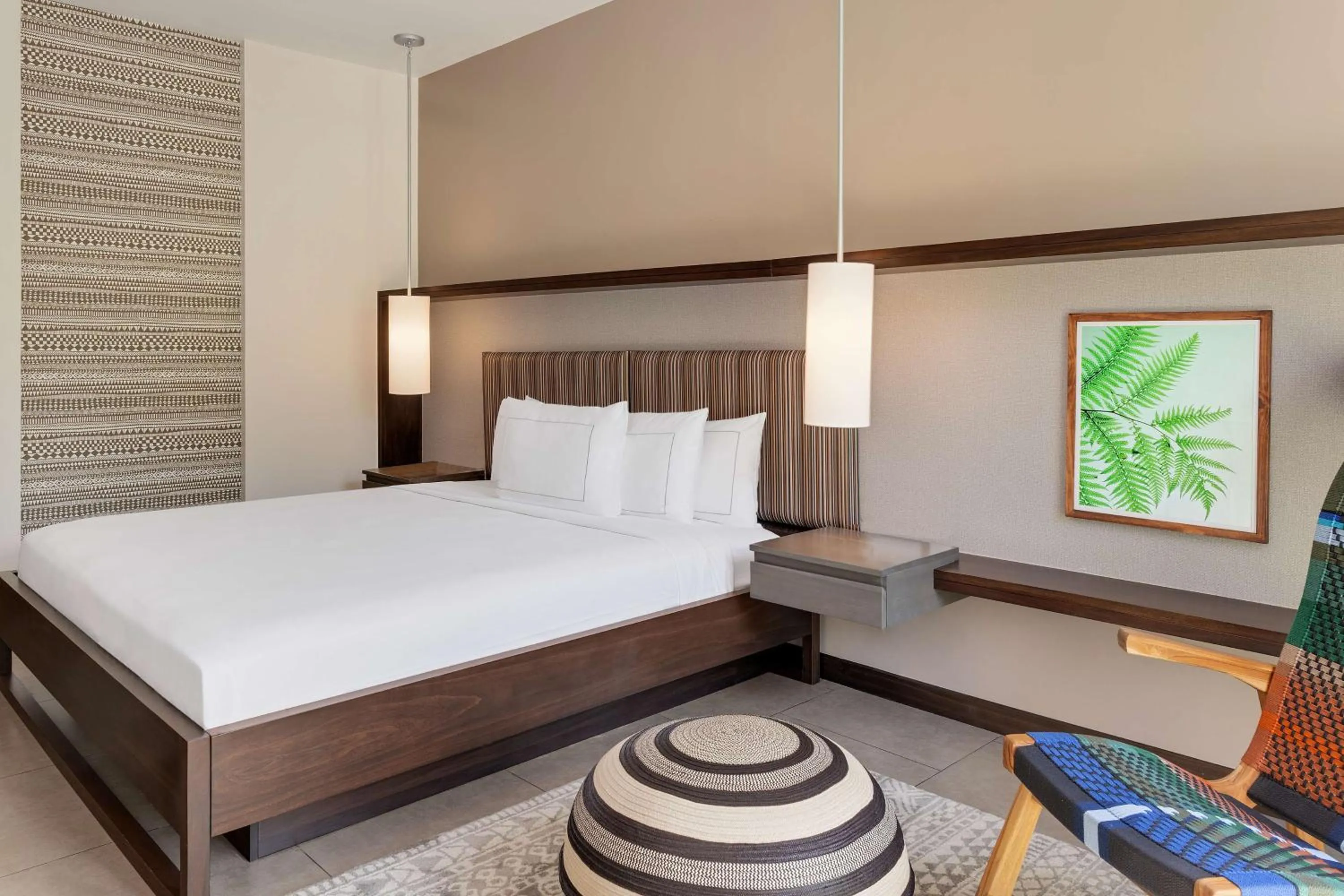 Bed in Botanika Osa Peninsula, Curio Collection By Hilton