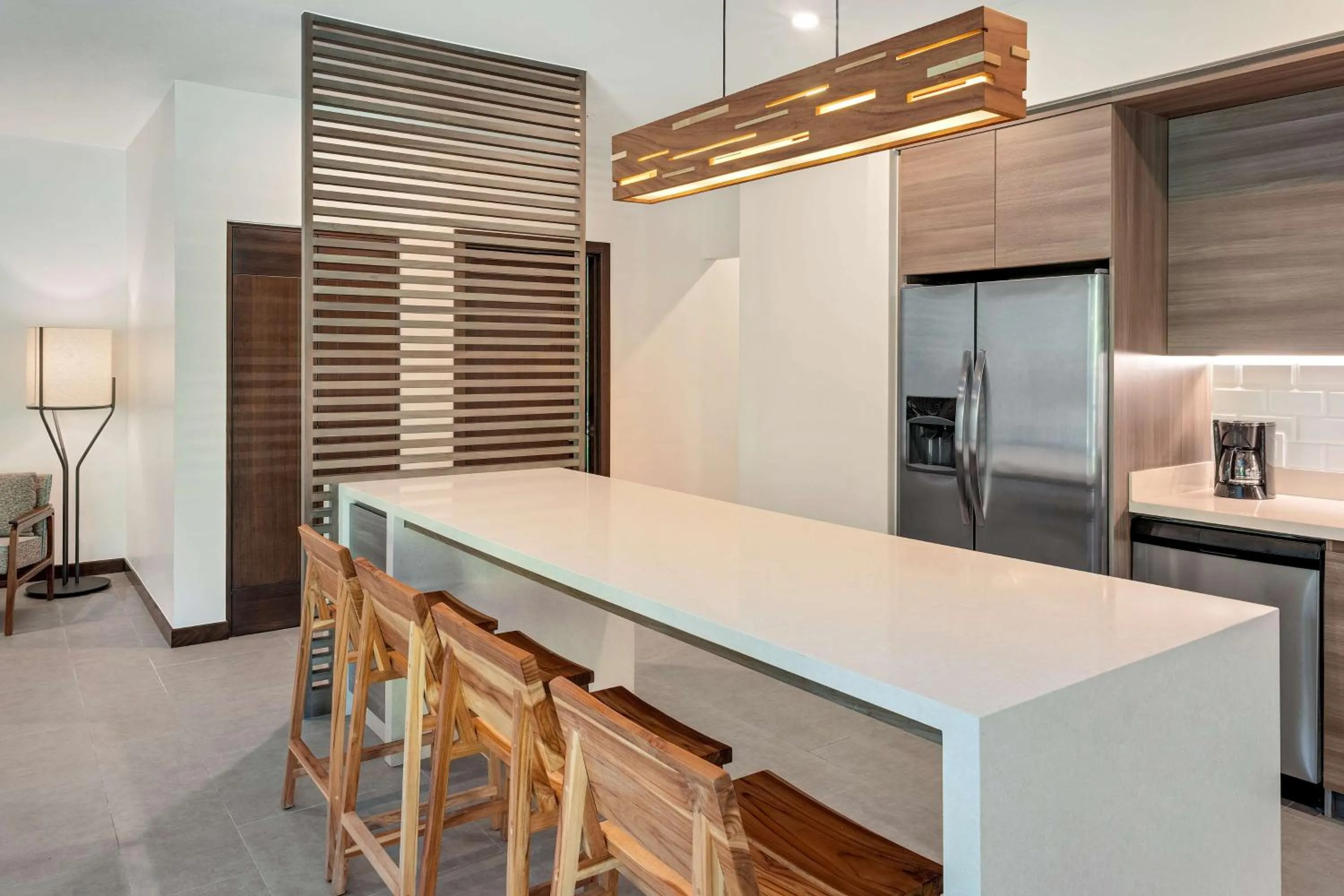 Kitchen or kitchenette in Botanika Osa Peninsula, Curio Collection By Hilton