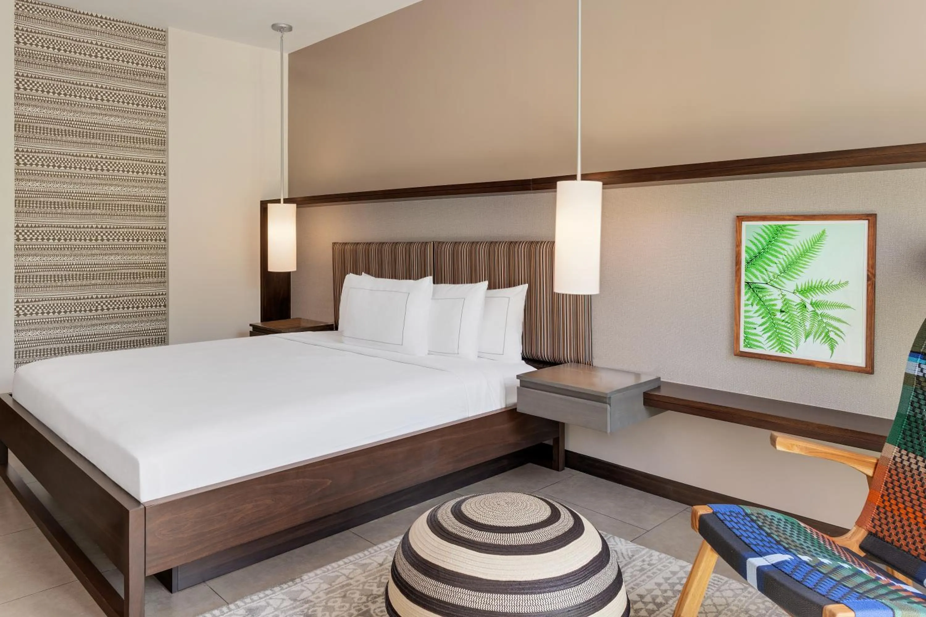 Bed in Botanika Osa Peninsula, Curio Collection By Hilton