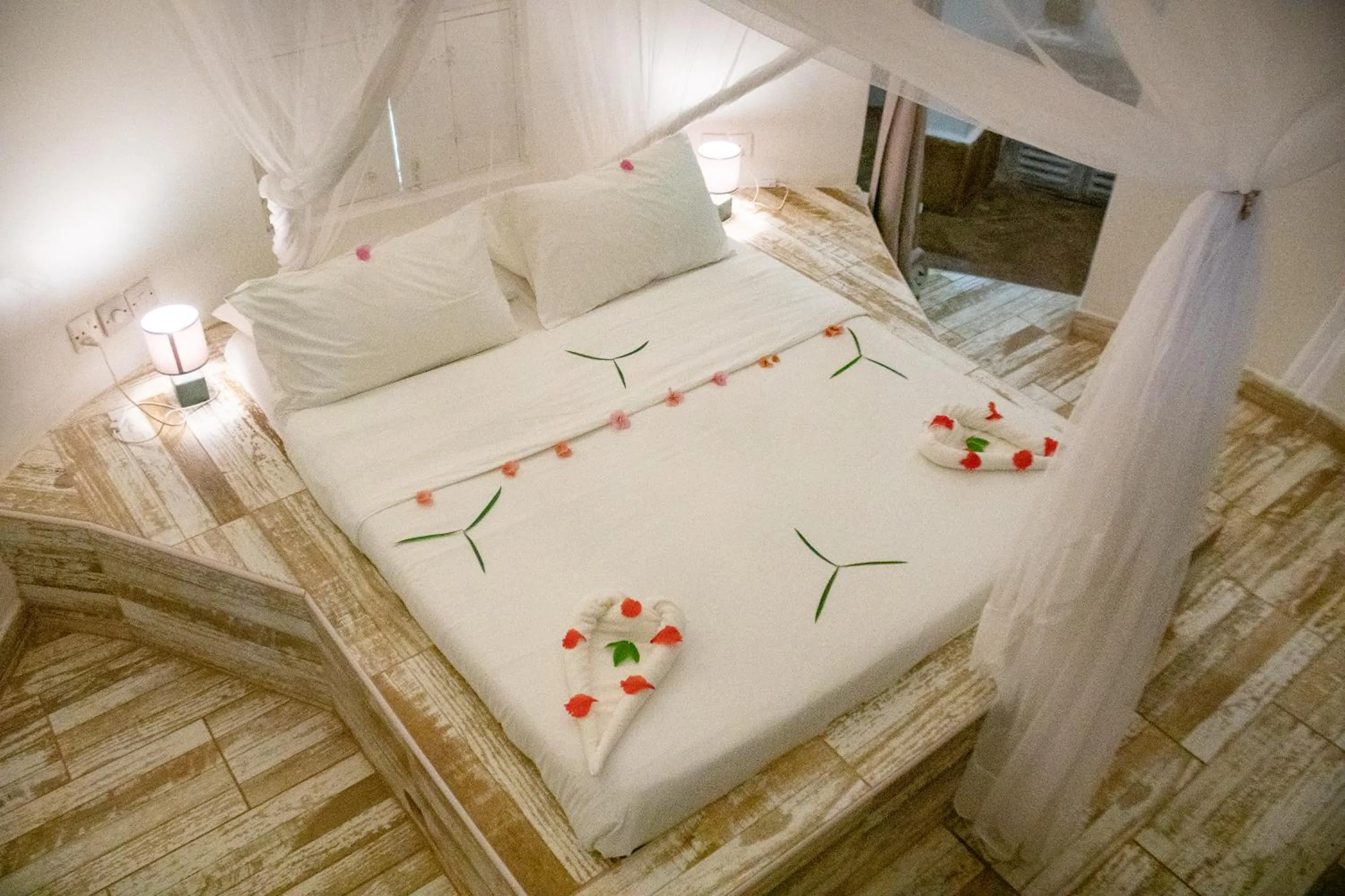 Bed in Eleven Pearl Boutique Hotel & Spa