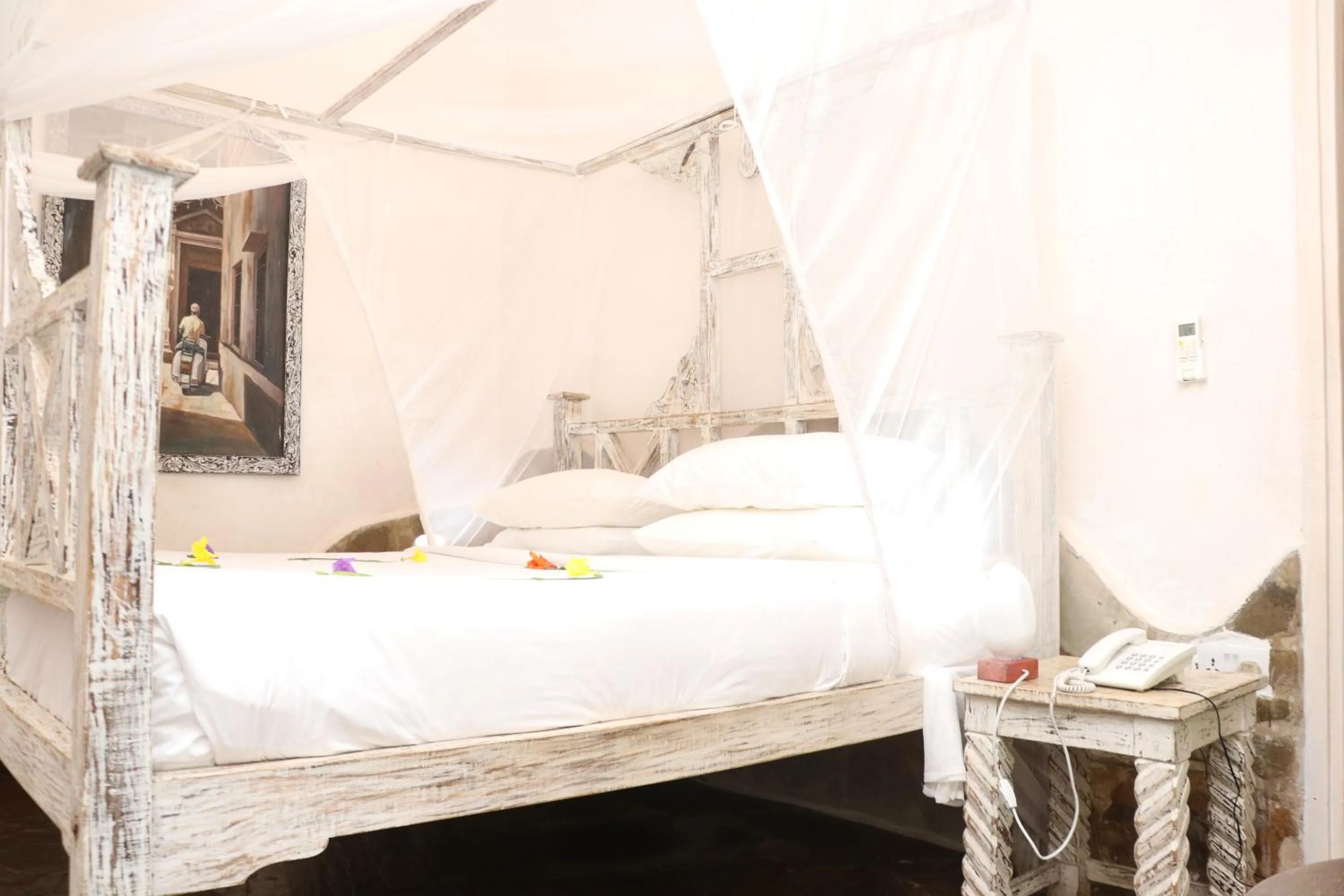 Bed in Eleven Pearl Boutique Hotel & Spa