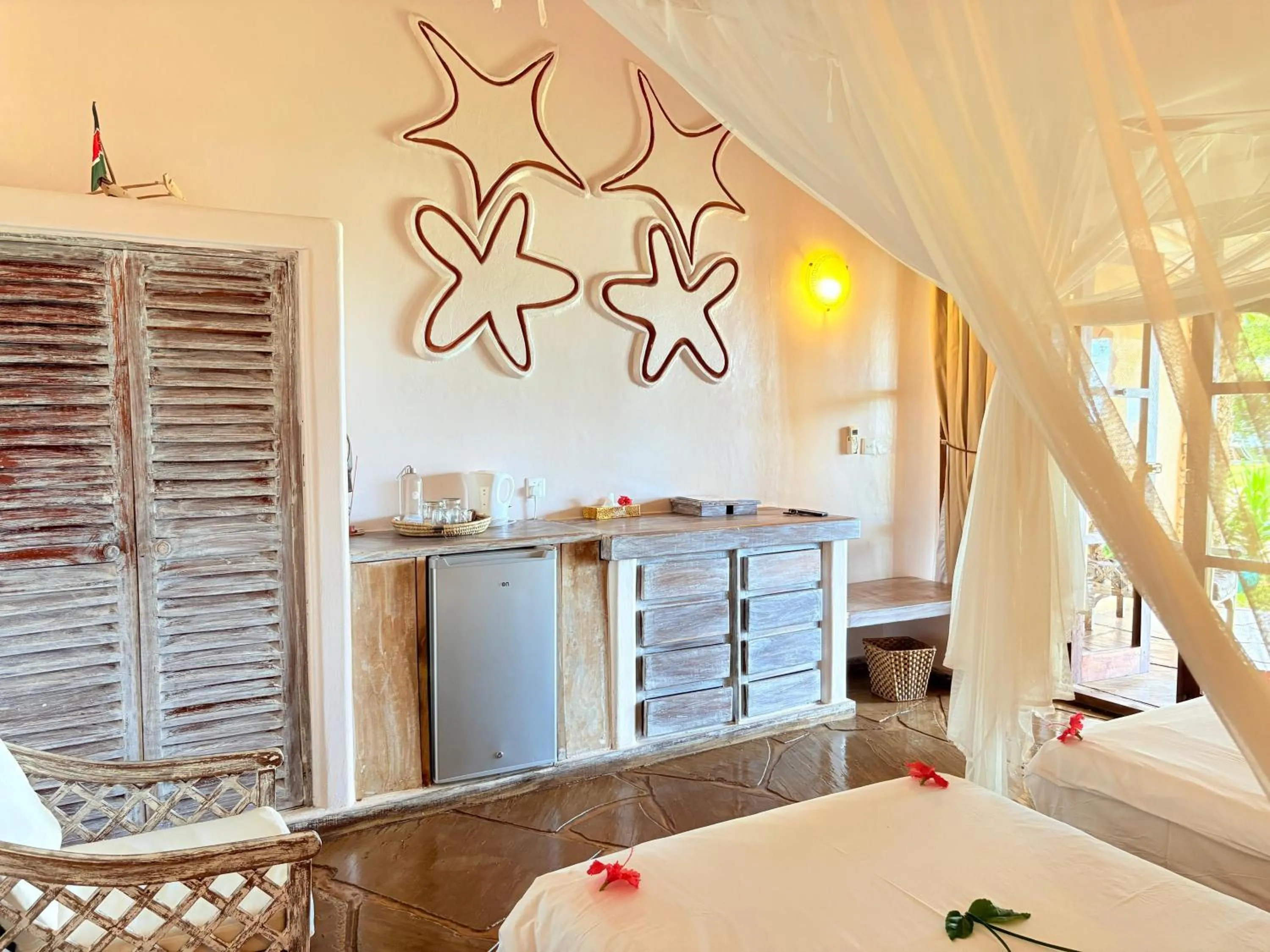 Bed in Eleven Pearl Boutique Hotel & Spa