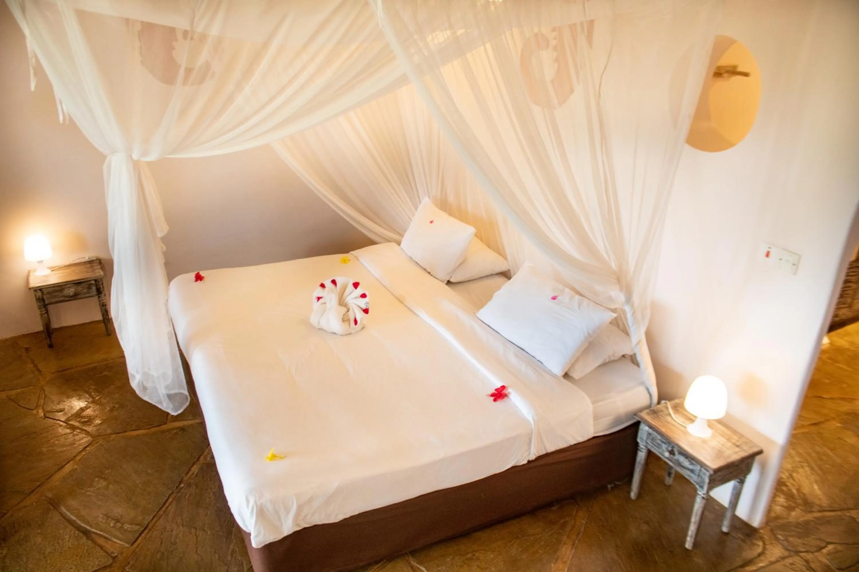 Bed in Eleven Pearl Boutique Hotel & Spa