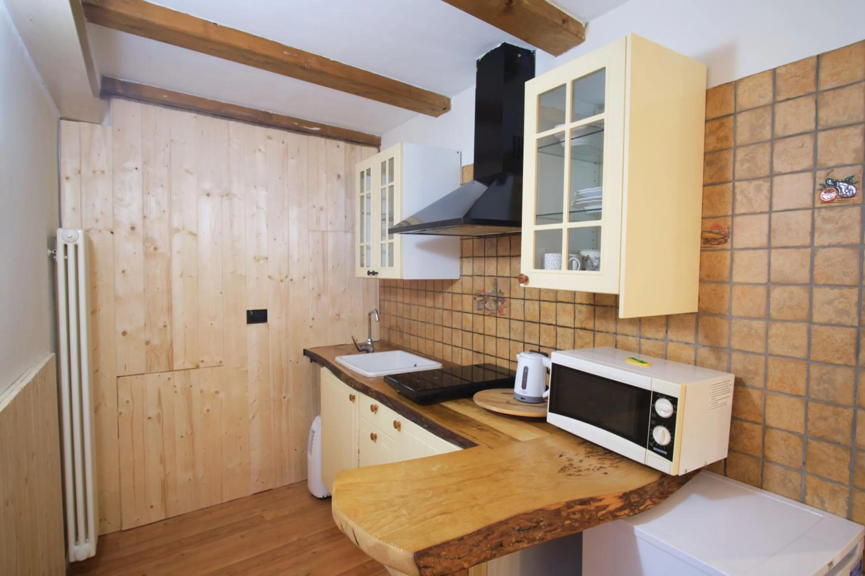 Kitchen or kitchenette in Casa Tomà
