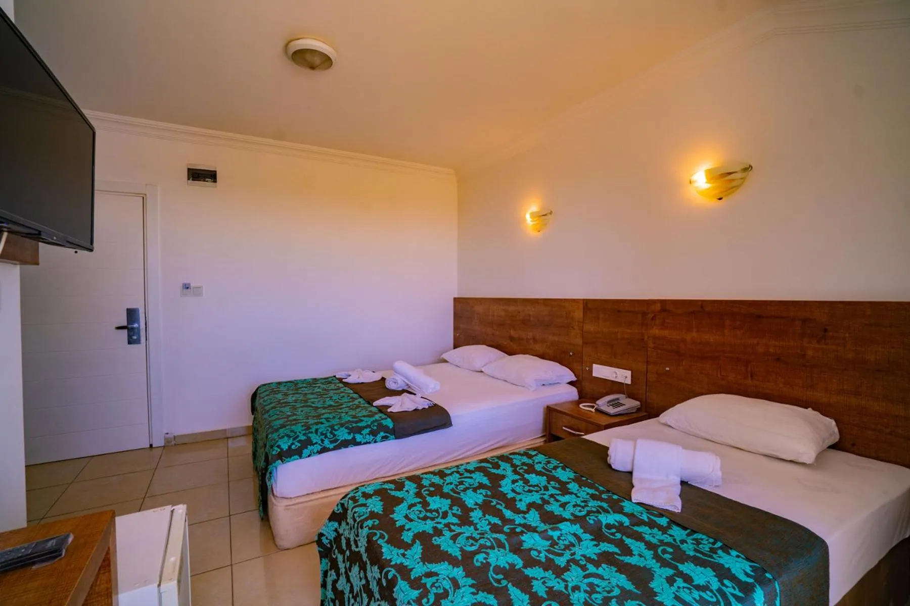 Bed in Prenses Sealine Beach Hotel