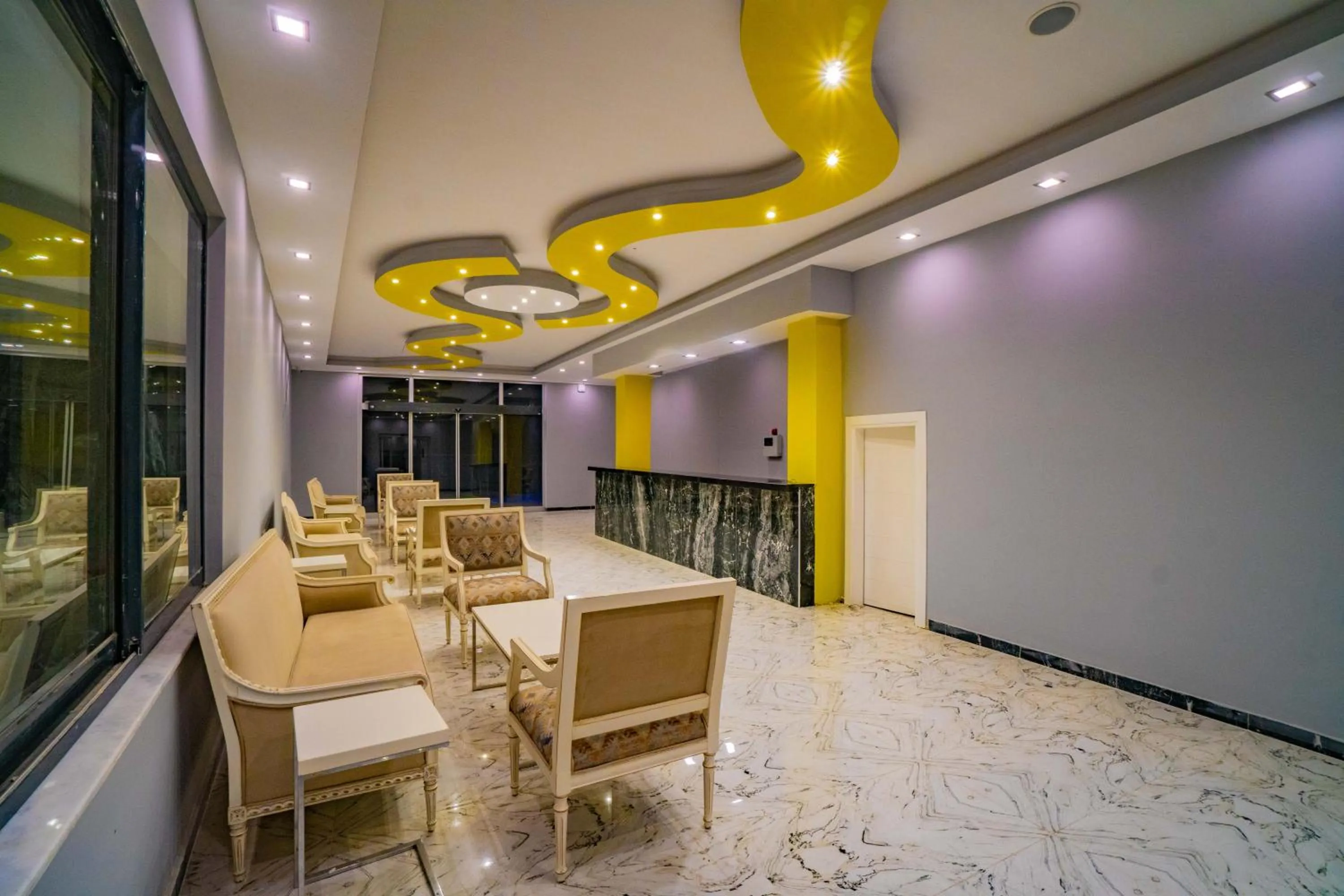 Living room in Prenses Sealine Beach Hotel