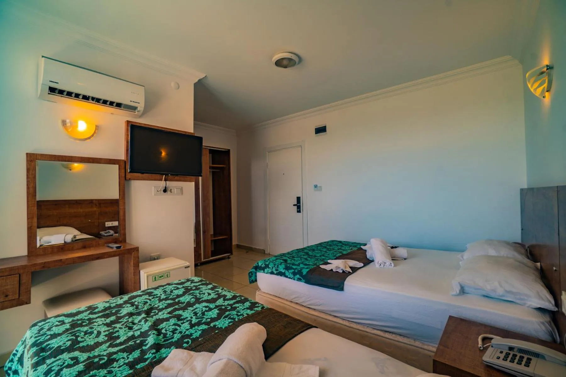 Bed in Prenses Sealine Beach Hotel