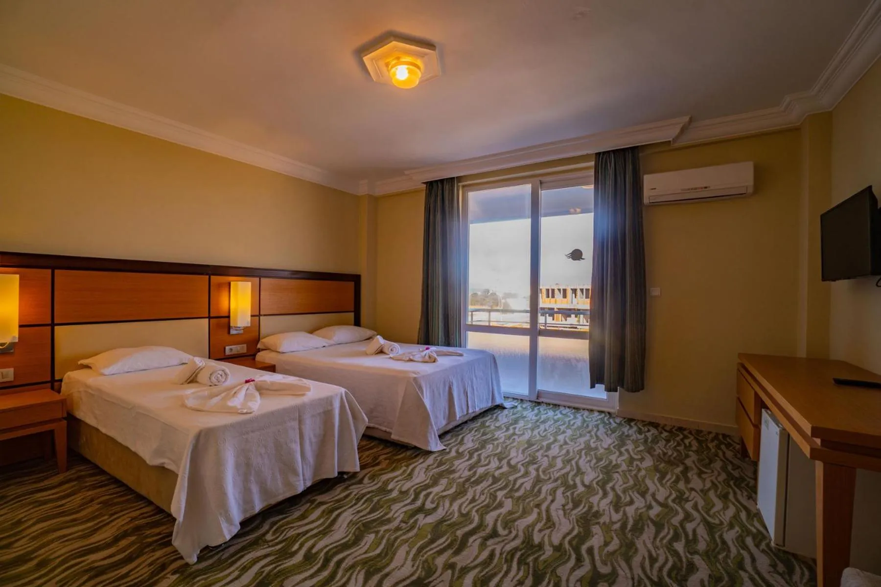 Bed in Prenses Sealine Beach Hotel