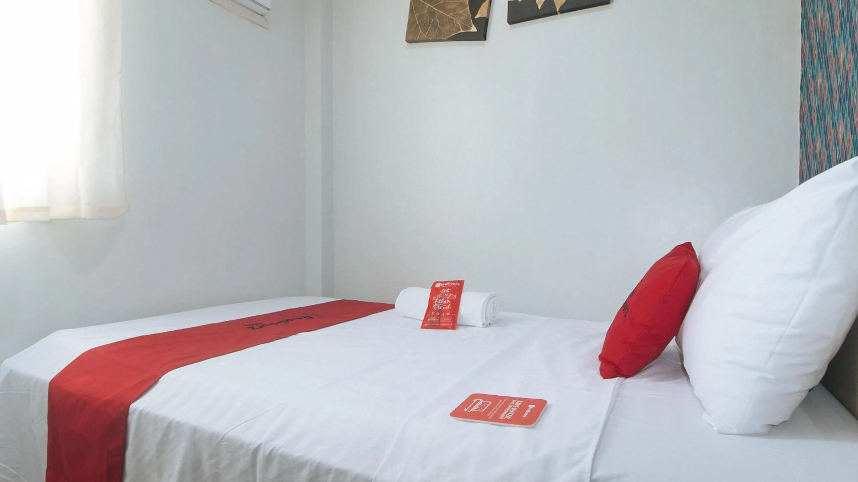 Photo of the whole room, Bed in RedDoorz Hostel @ St. Paul Village LapuLapu