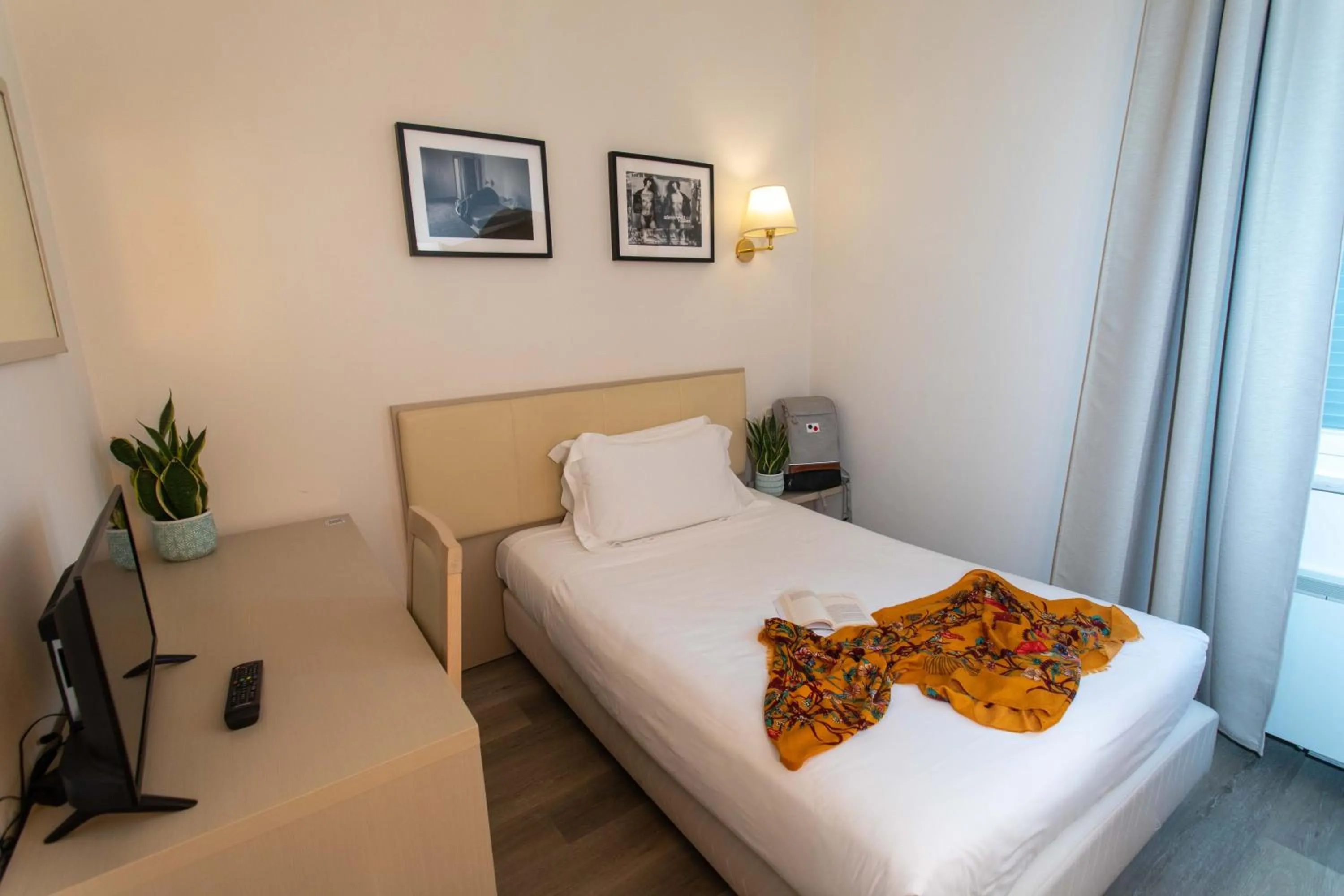 Bed in Hotel L'Aretino