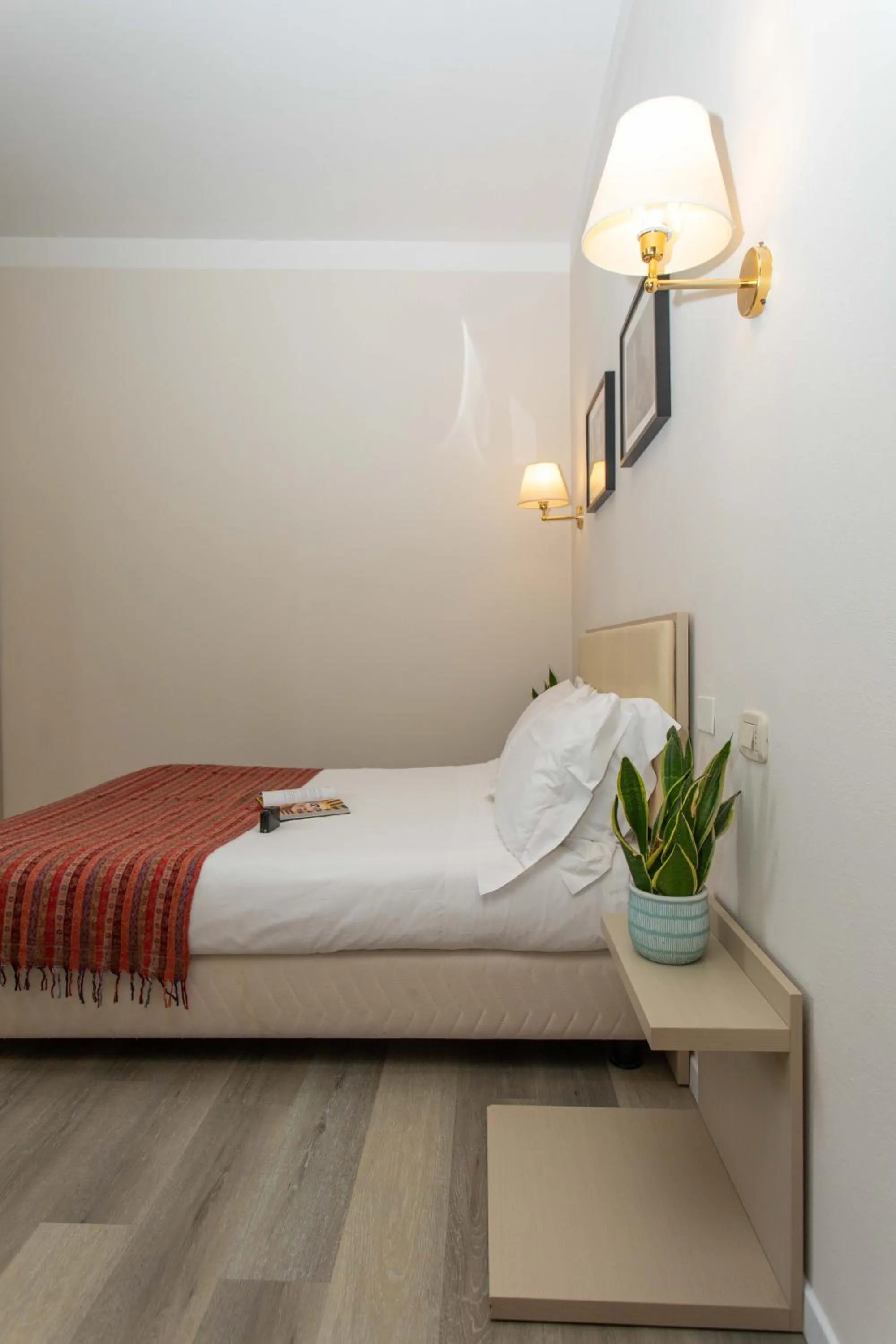 Bed in Hotel L'Aretino