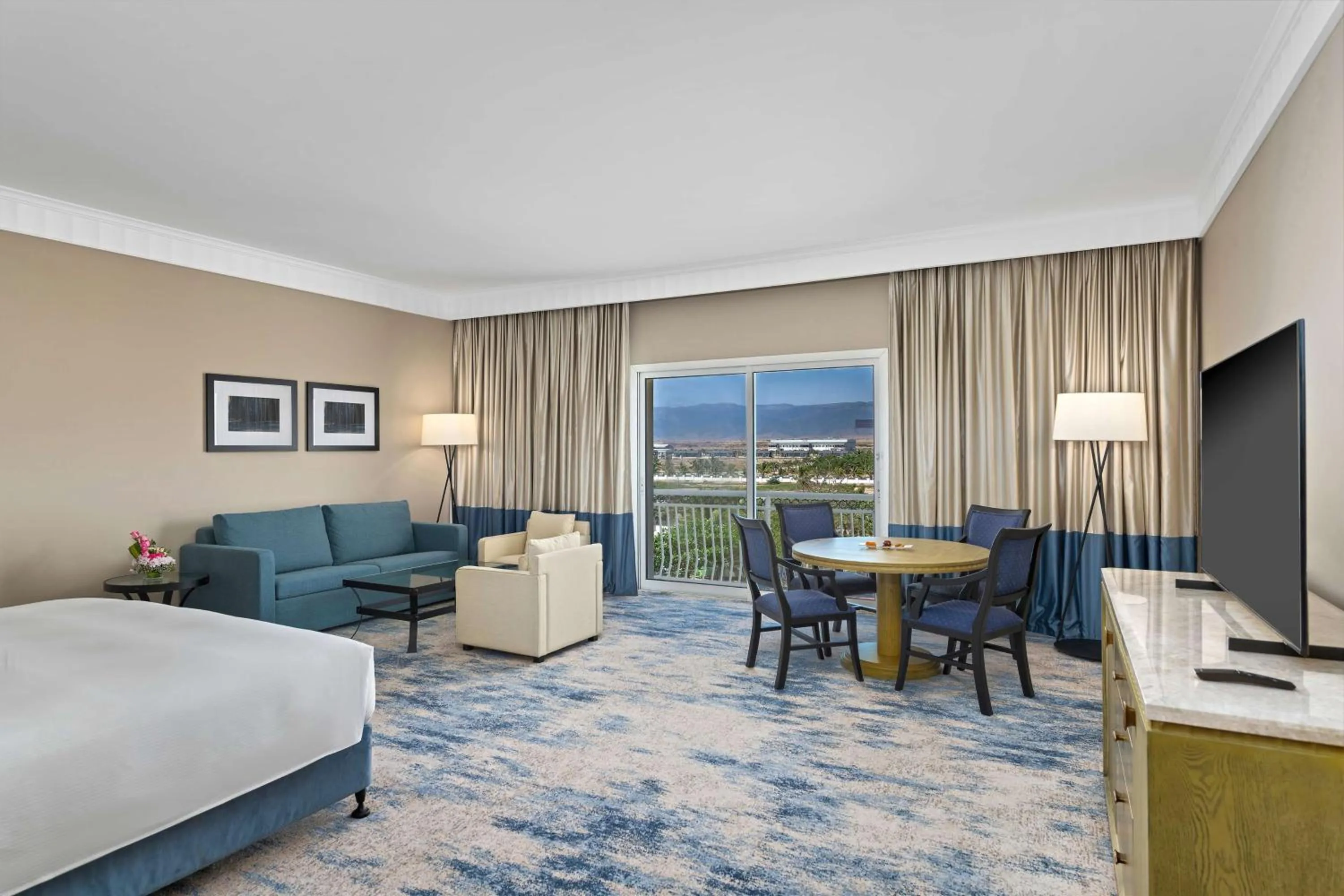 Living room, Bed in Hilton Salalah Resort