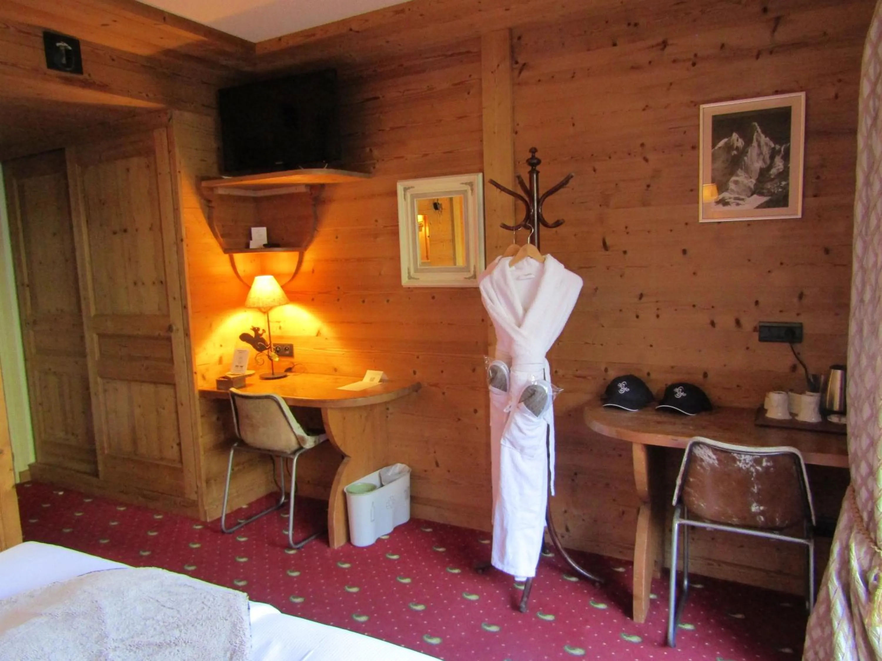 Seating area, Bed in Les Grands Montets Hotel & Spa