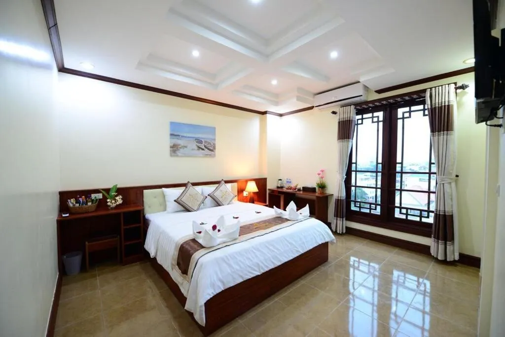 Bed in Vientiane Luxury Hotel
