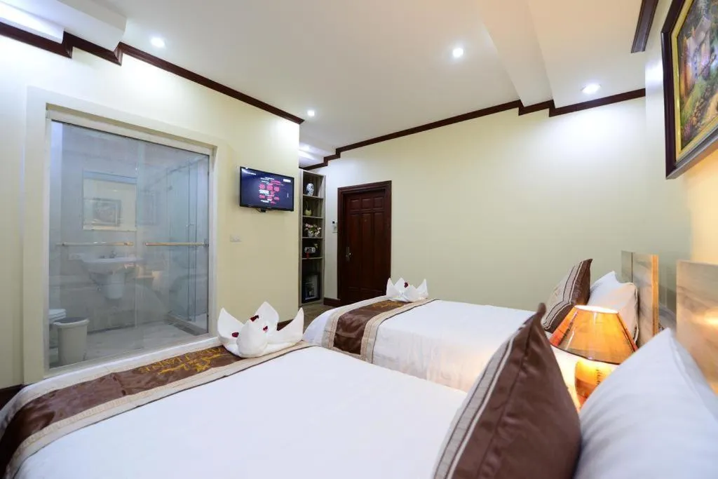 Bed in Vientiane Luxury Hotel