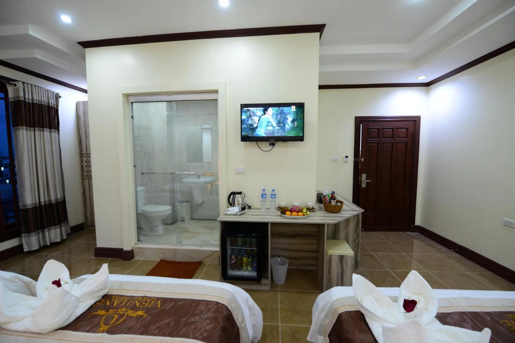 Photo of the whole room, Bed in Vientiane Luxury Hotel