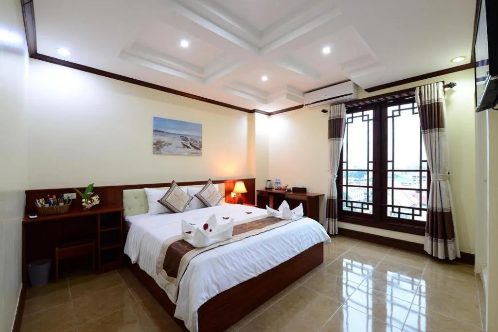 Bed in Vientiane Luxury Hotel