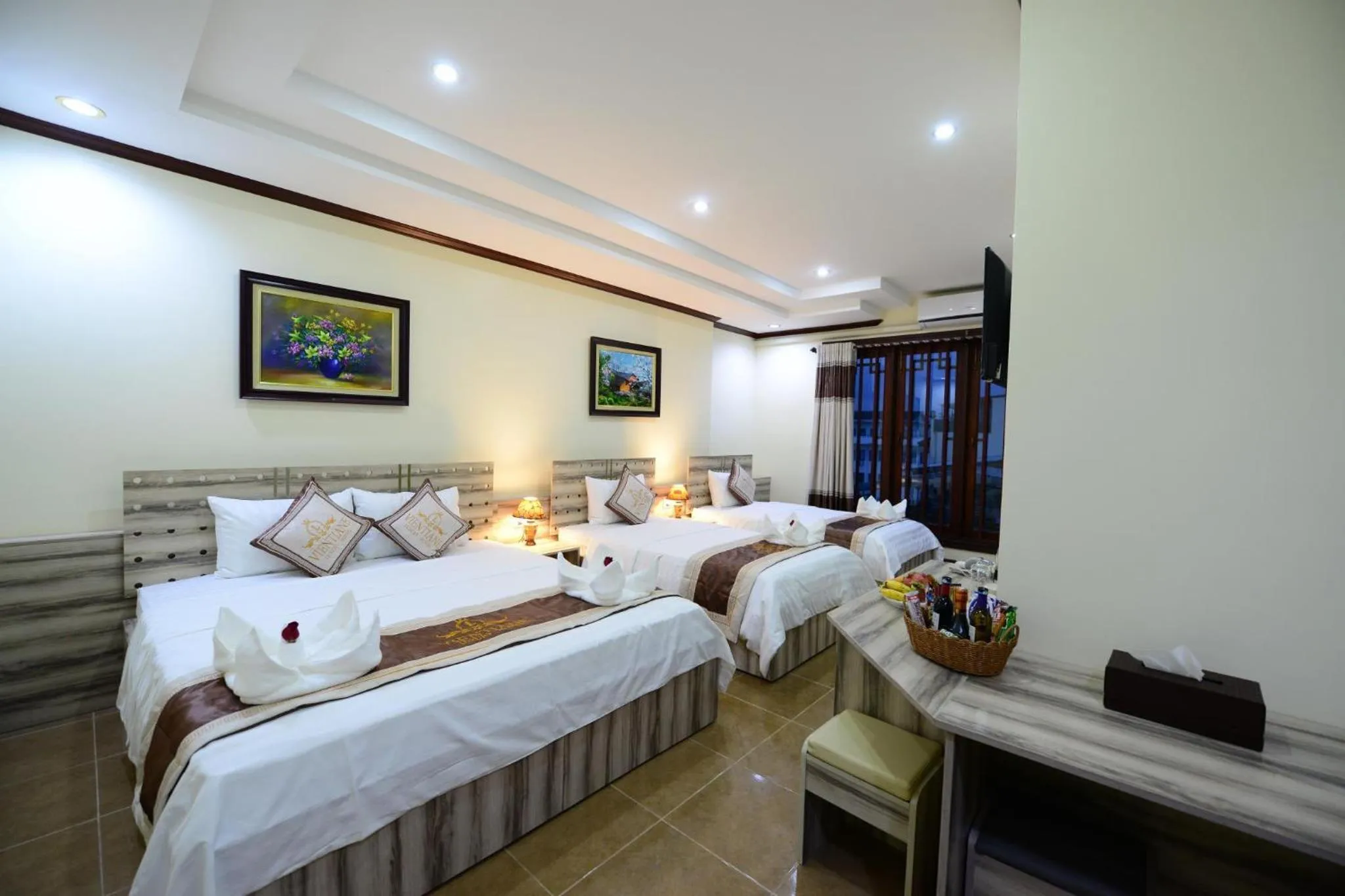 Photo of the whole room, Bed in Vientiane Luxury Hotel