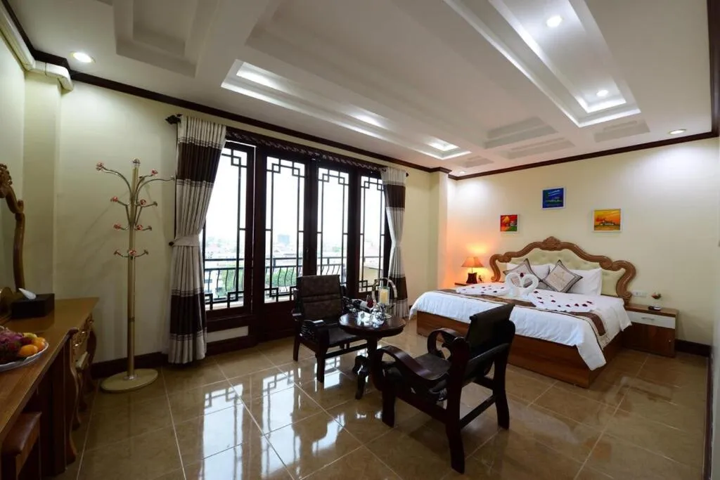 Bed in Vientiane Luxury Hotel