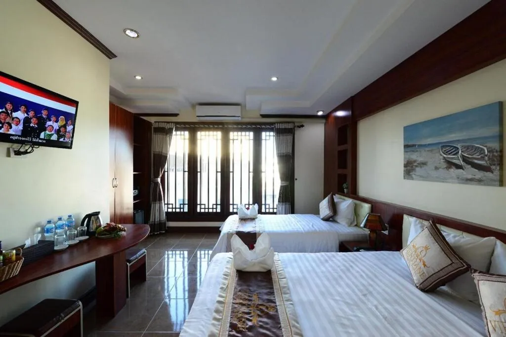 Bed in Vientiane Luxury Hotel