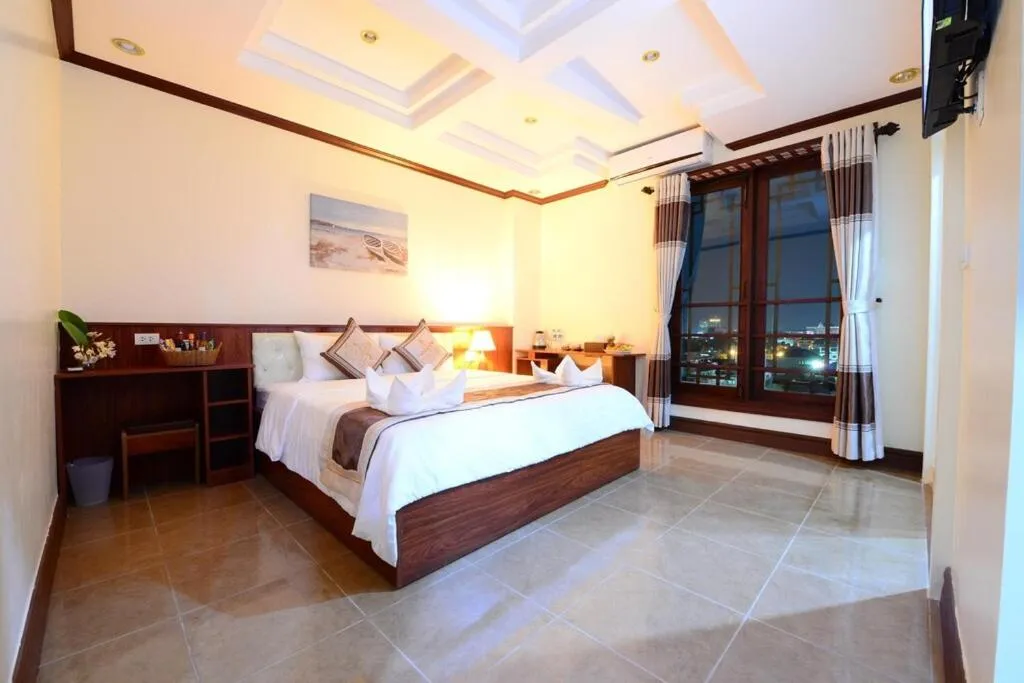 Bed in Vientiane Luxury Hotel