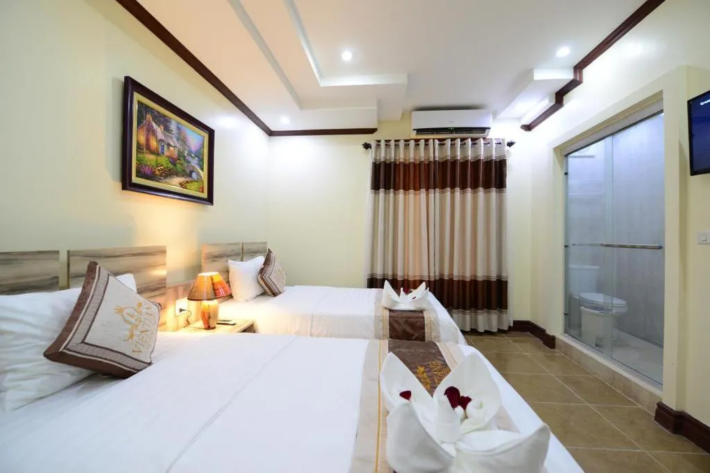 Bed in Vientiane Luxury Hotel