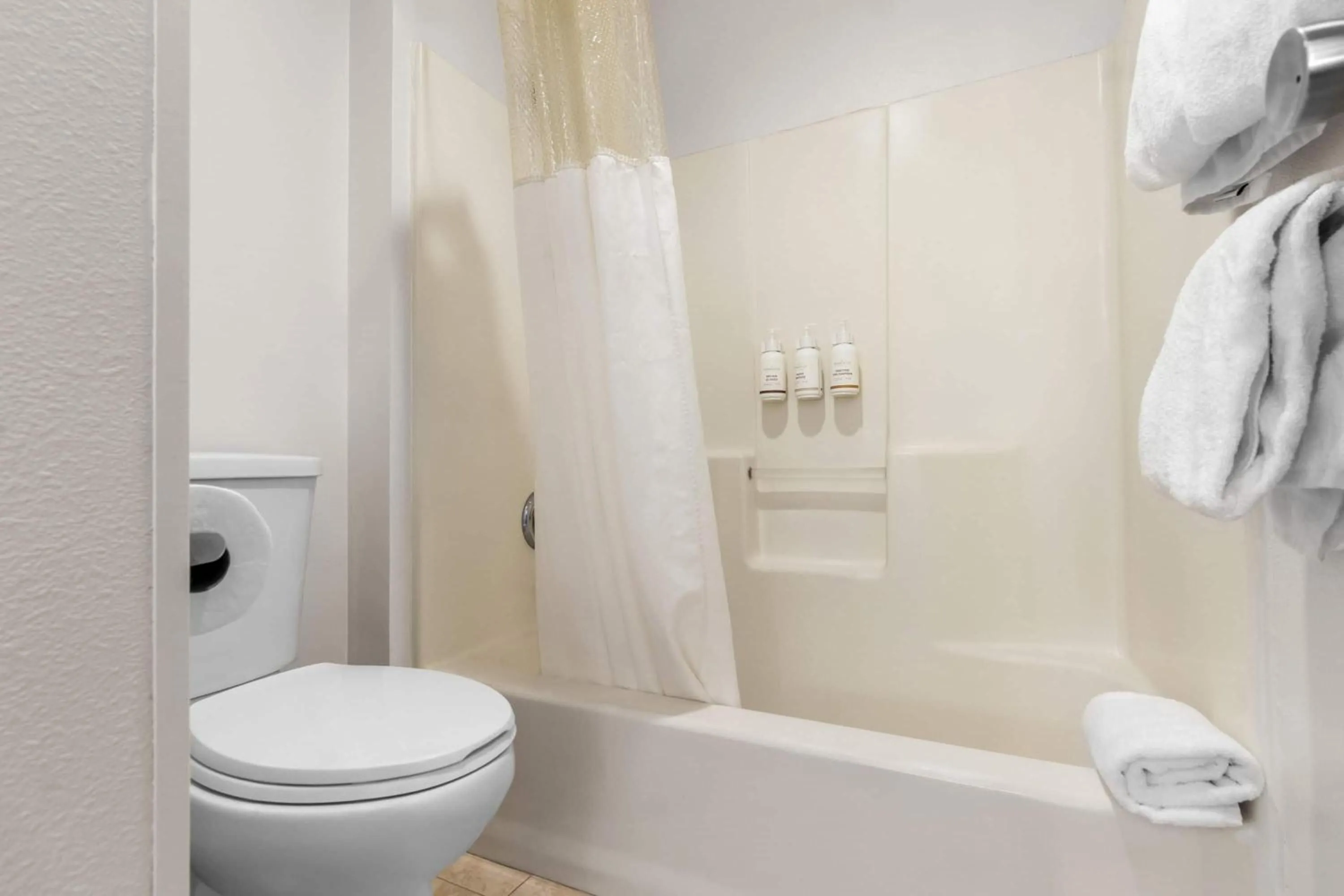 Bathroom in Baymont by Wyndham Arlington At Six Flags Dr