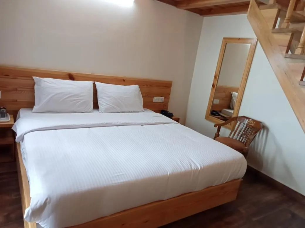 Bed in The Kumaon Retreat