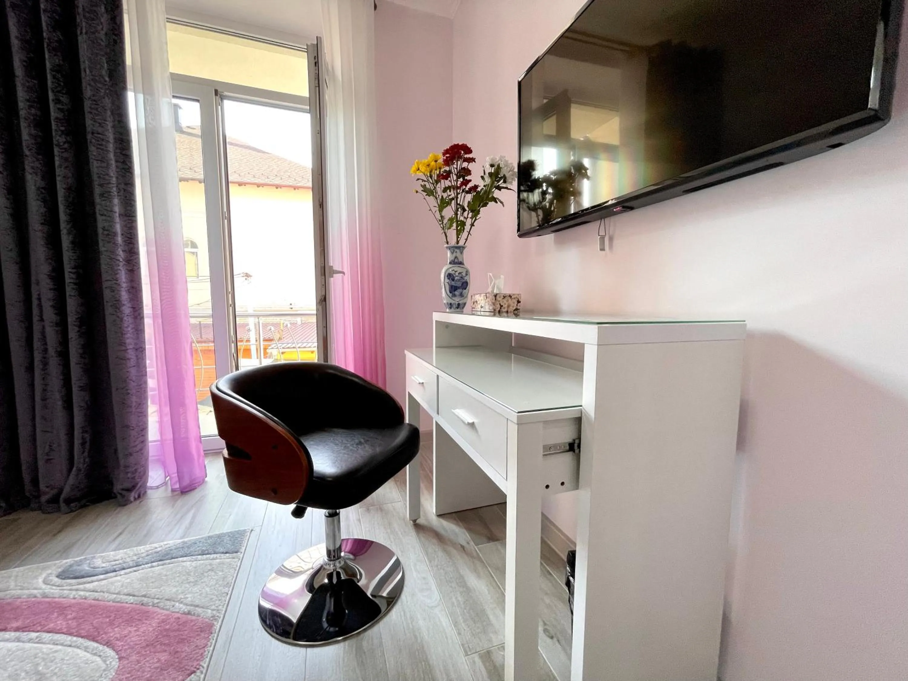 TV and multimedia in Premier City Apart Hotel Chisinau