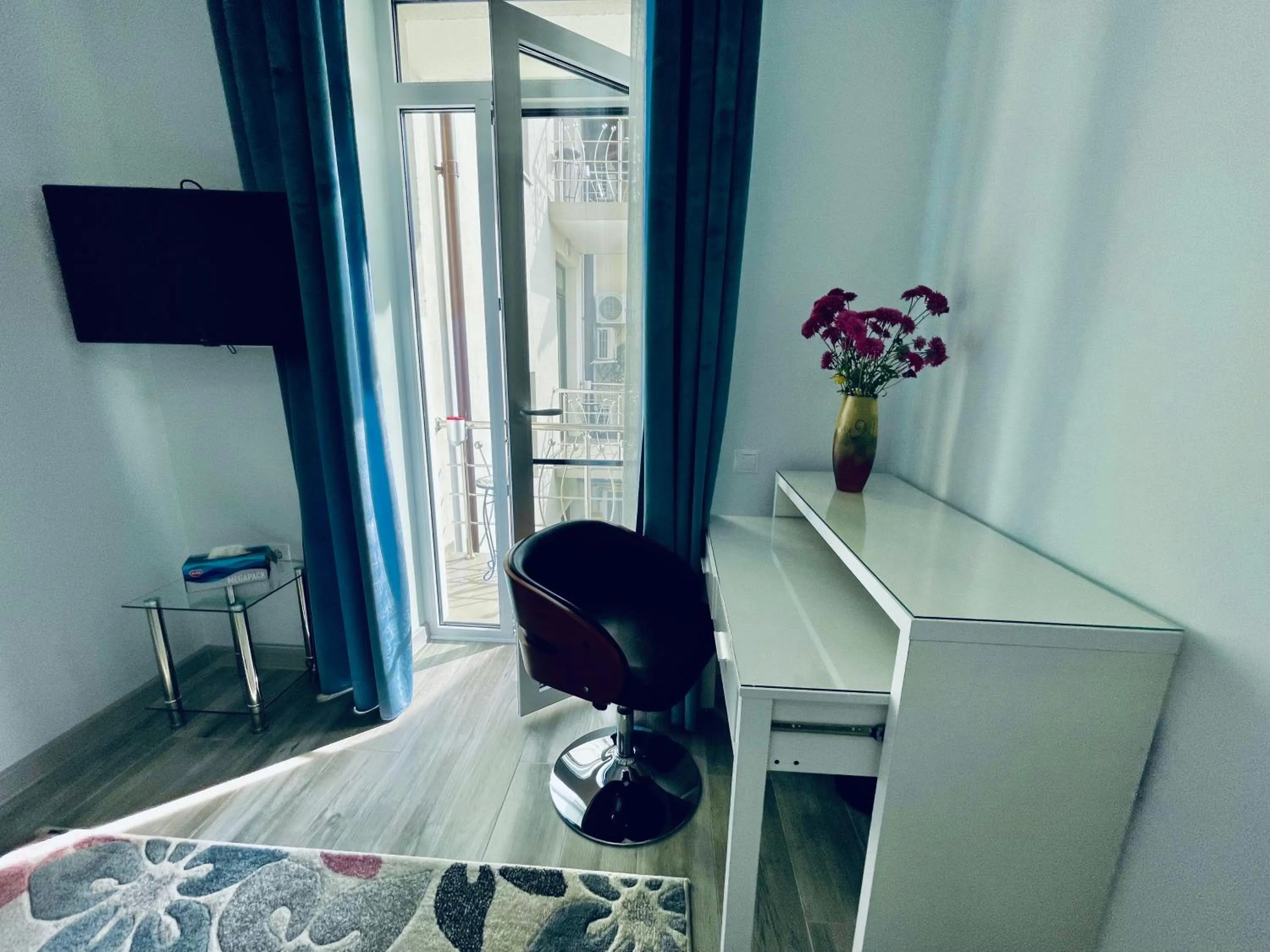 Seating area in Premier City Apart Hotel Chisinau