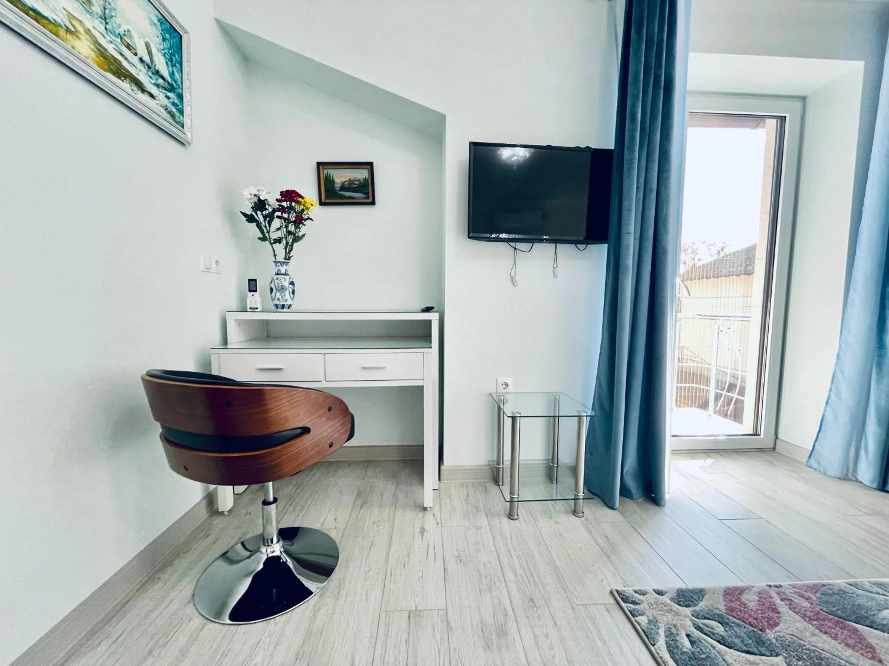 TV and multimedia in Premier City Apart Hotel Chisinau