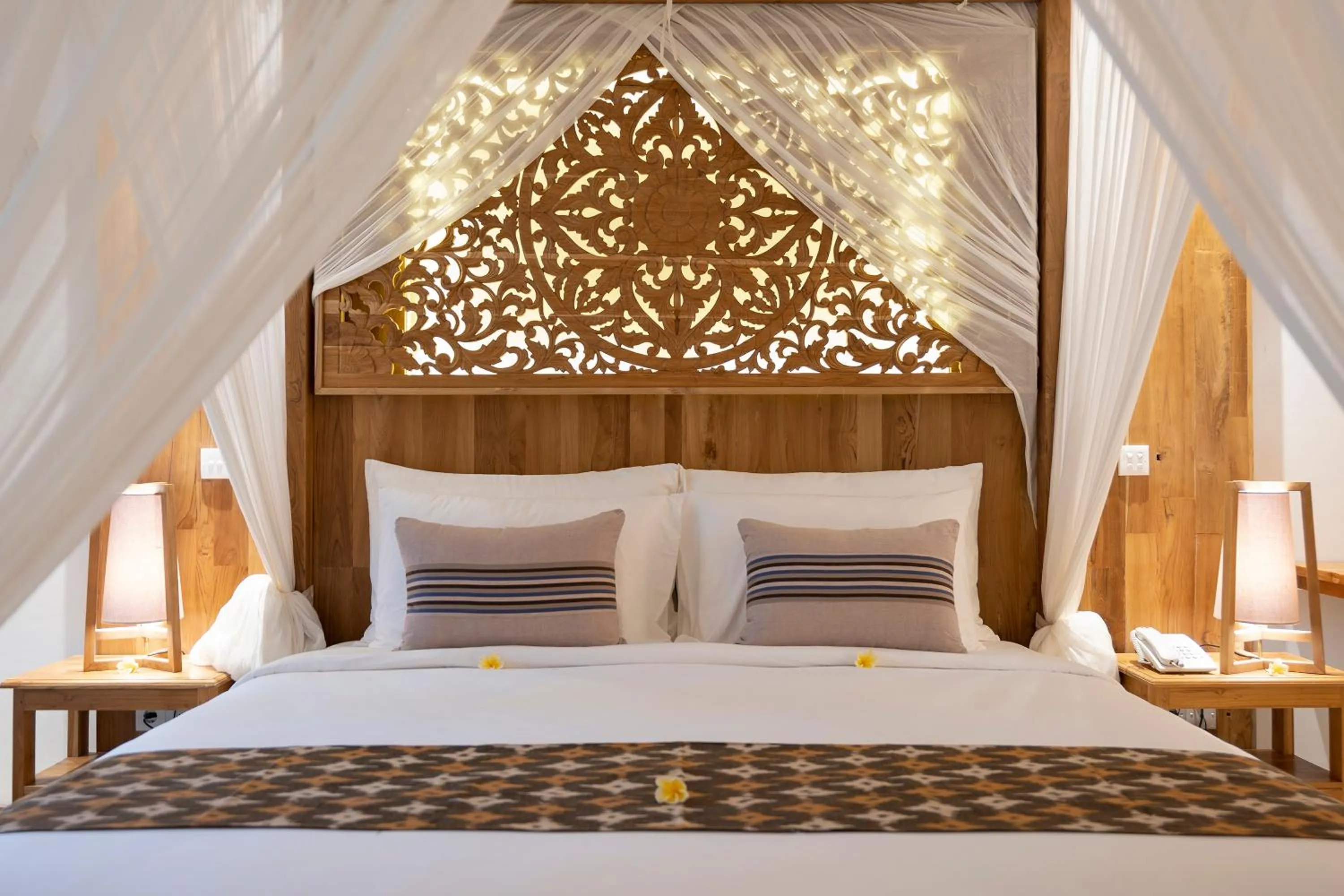Bed in Vije Boutique Resort & Spa