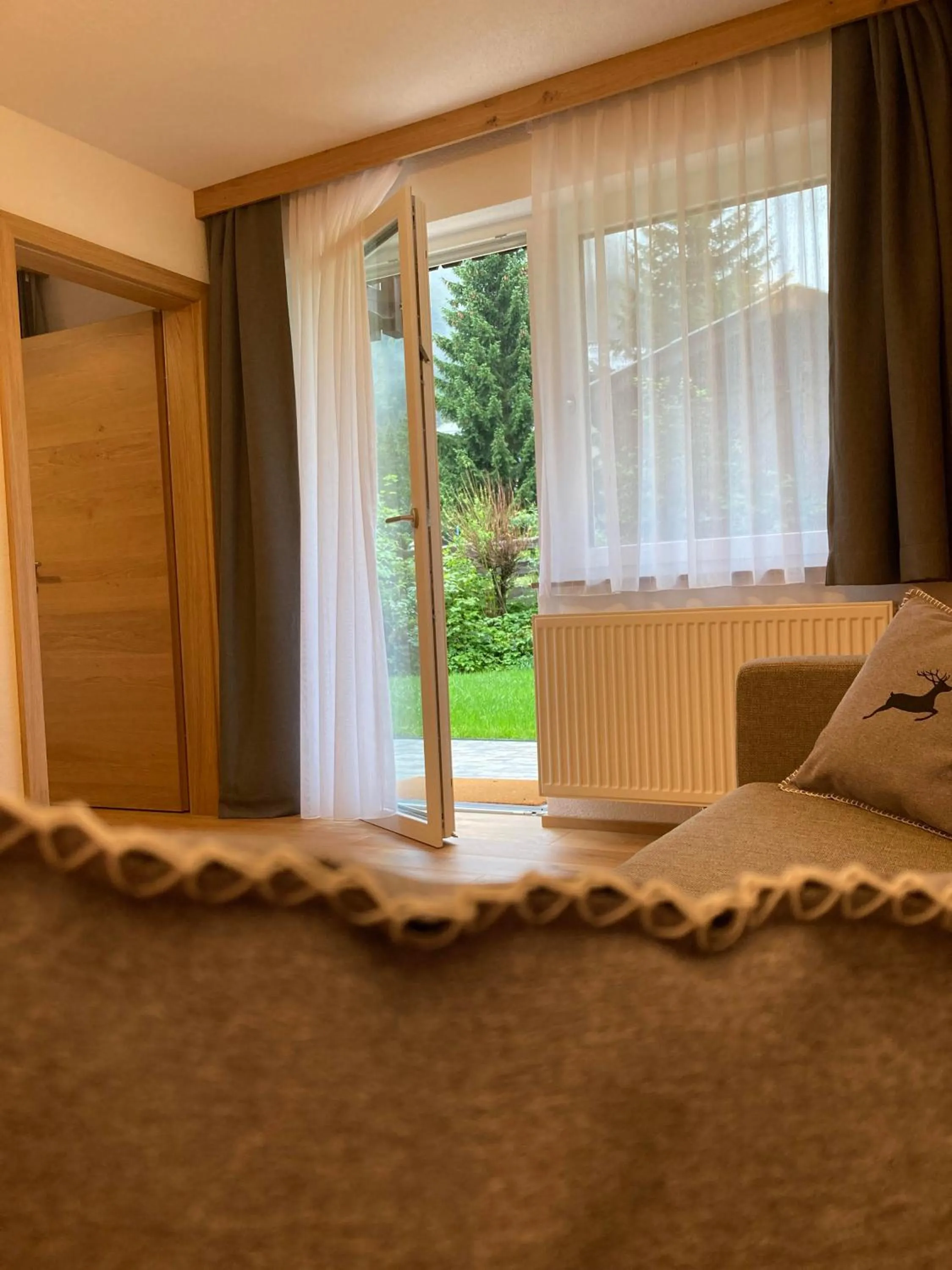 Living room, Bed in Apartments Hohenberger Mallnitz - Mein Platz in den Bergen!