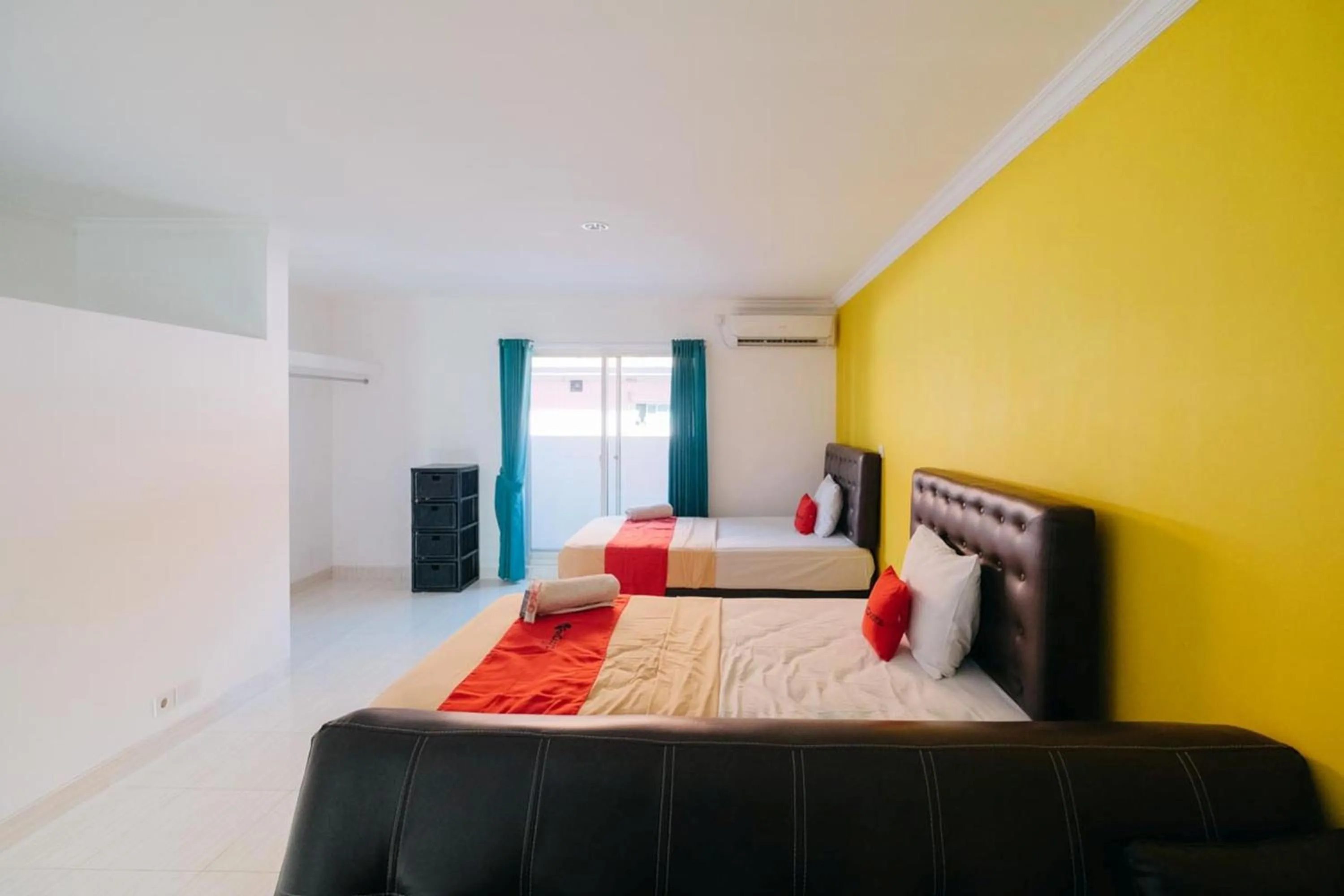 Bed in RedDoorz at Kawaii Apartment Jimbaran