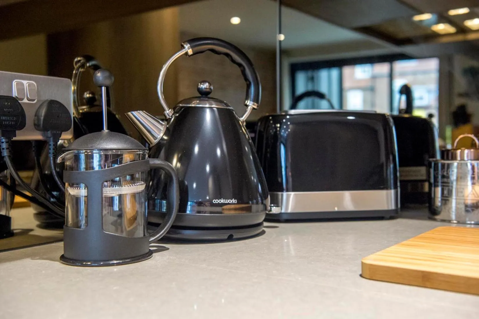 Kitchen or kitchenette in The Quadrant - The Palm Suite