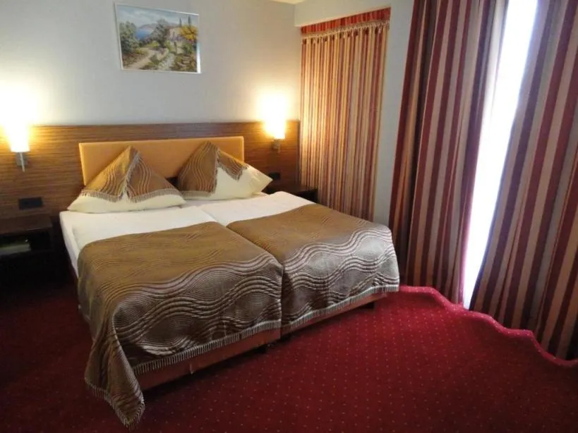 Bed in Grand Hotel Dream Main City Center