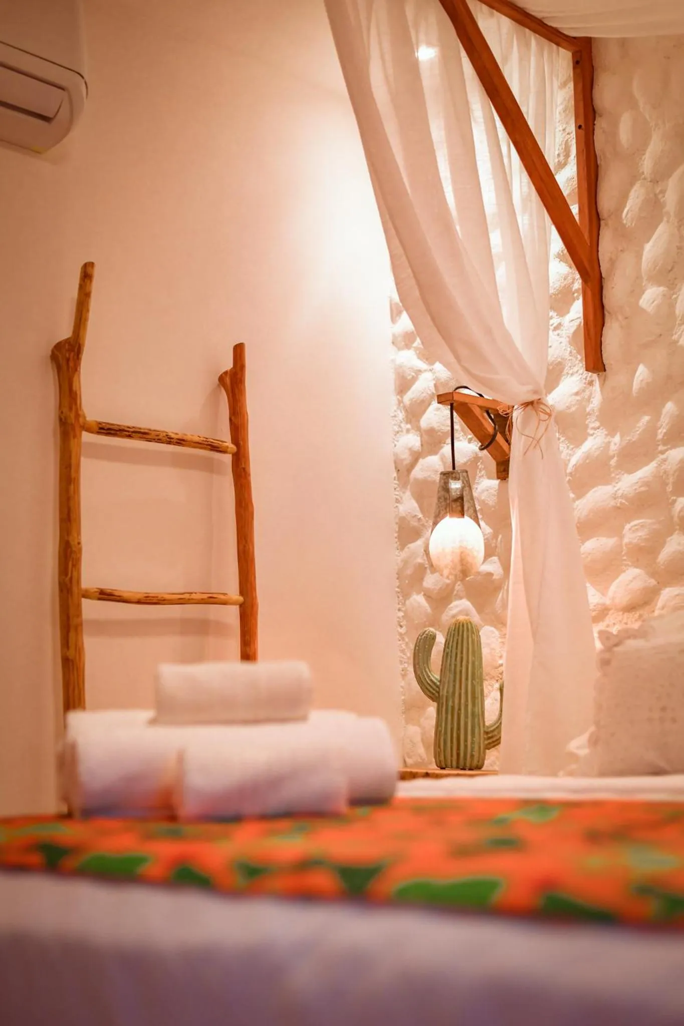 Bed in EcoCharme Pousada Netuno