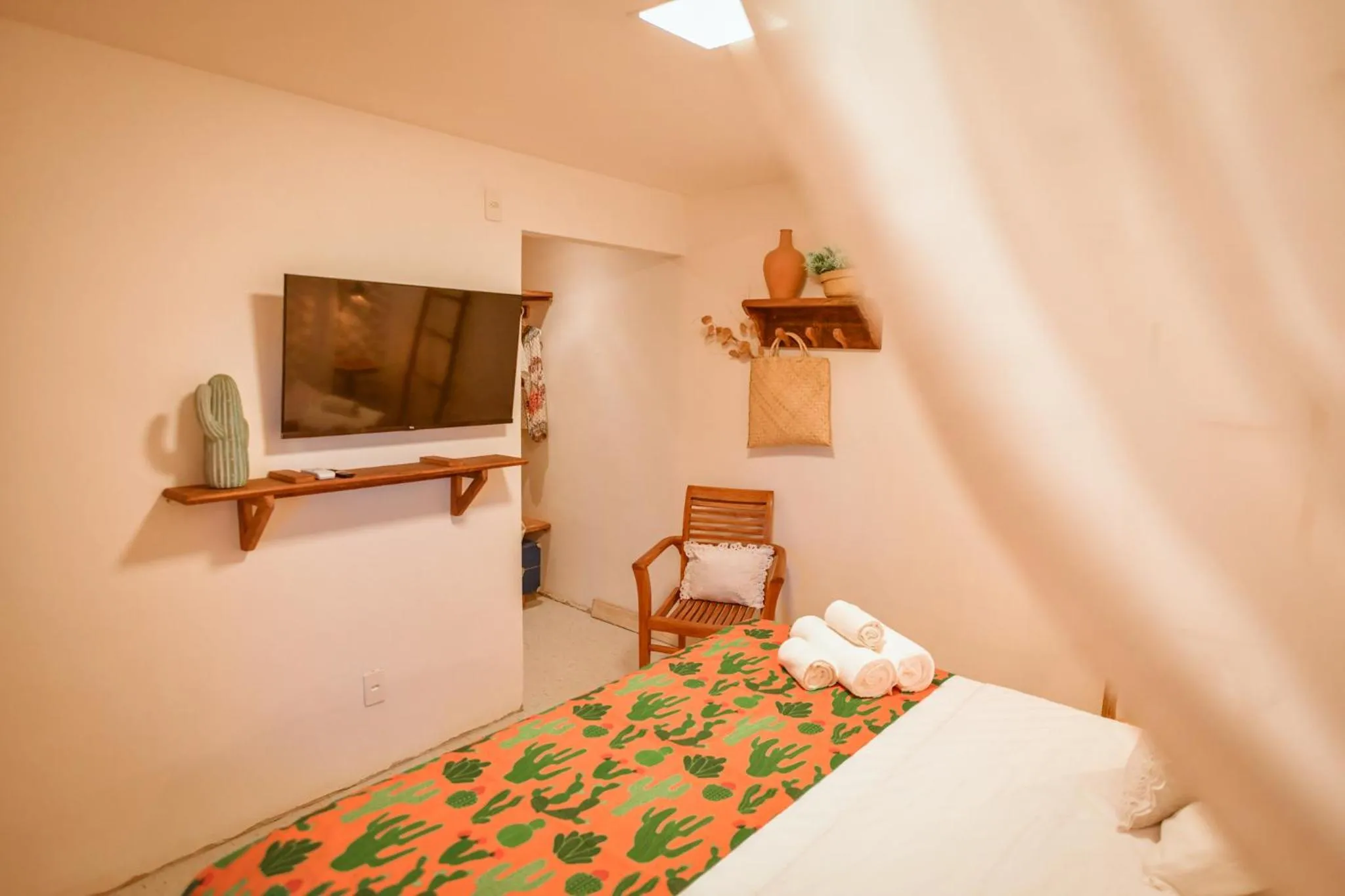 Decorative detail, Bed in EcoCharme Pousada Netuno