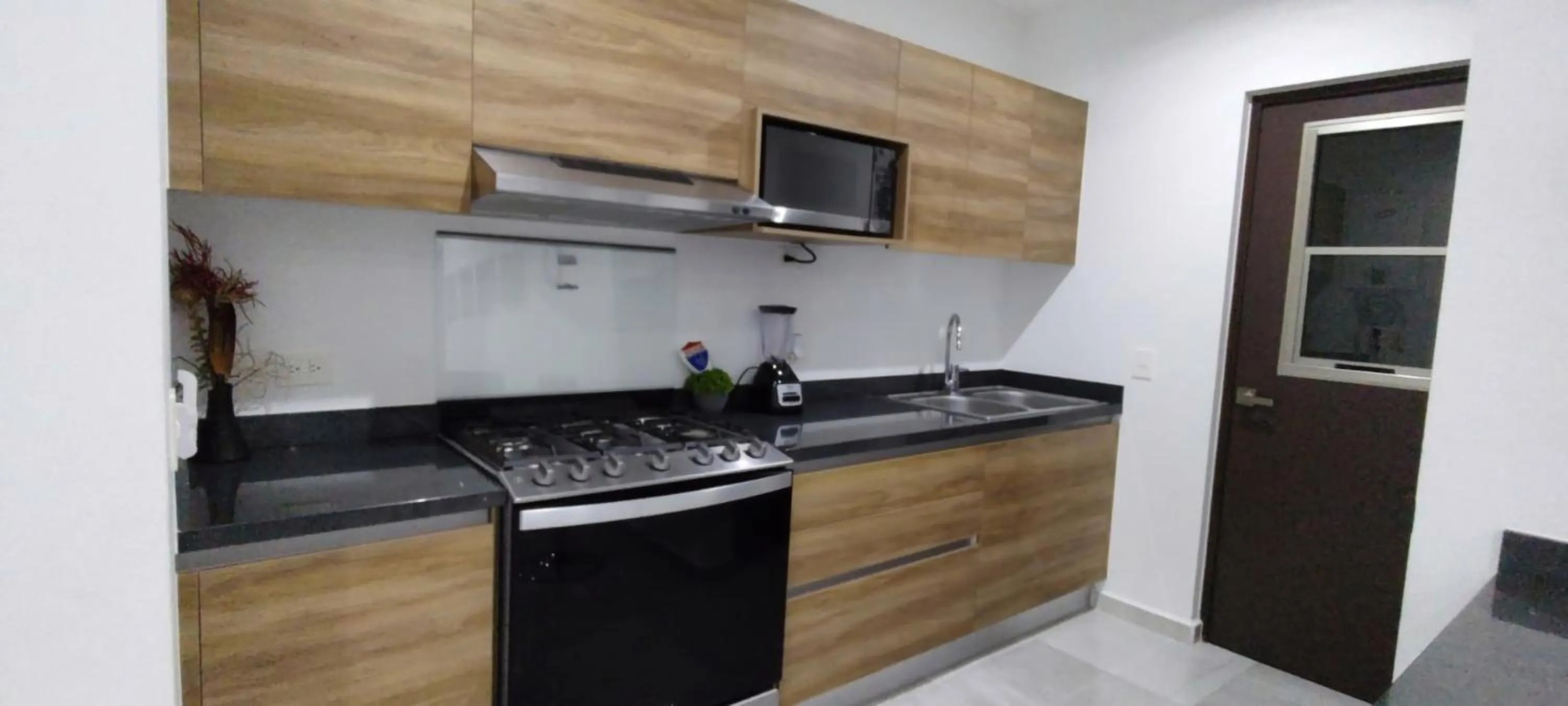 Kitchen or kitchenette in Gorgeous Apartment HOEStel Long Island!