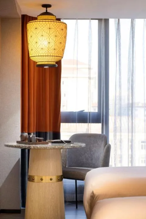 Seating area, Bed in Arthur Hotel Canton Tower Guangzhou