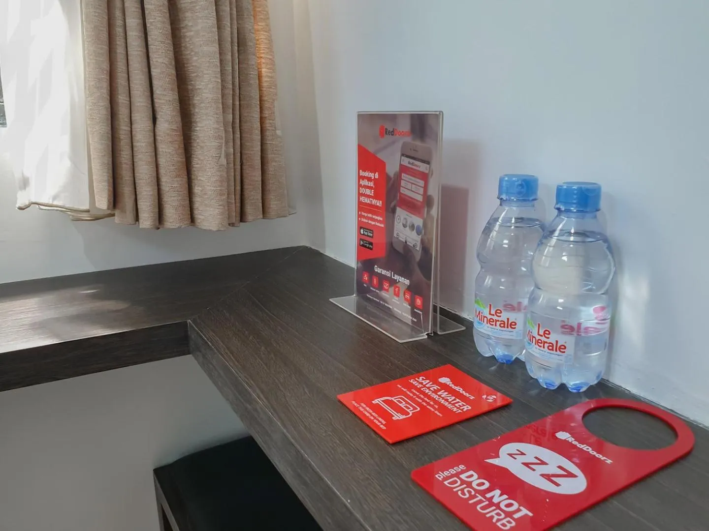 Drinks in RedDoorz near Istana Plaza 3