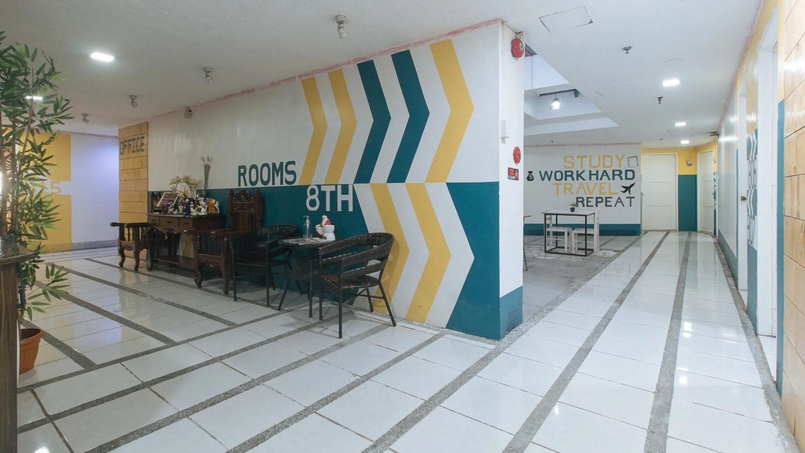 Seating area in RedDoorz at Crowne One Condo