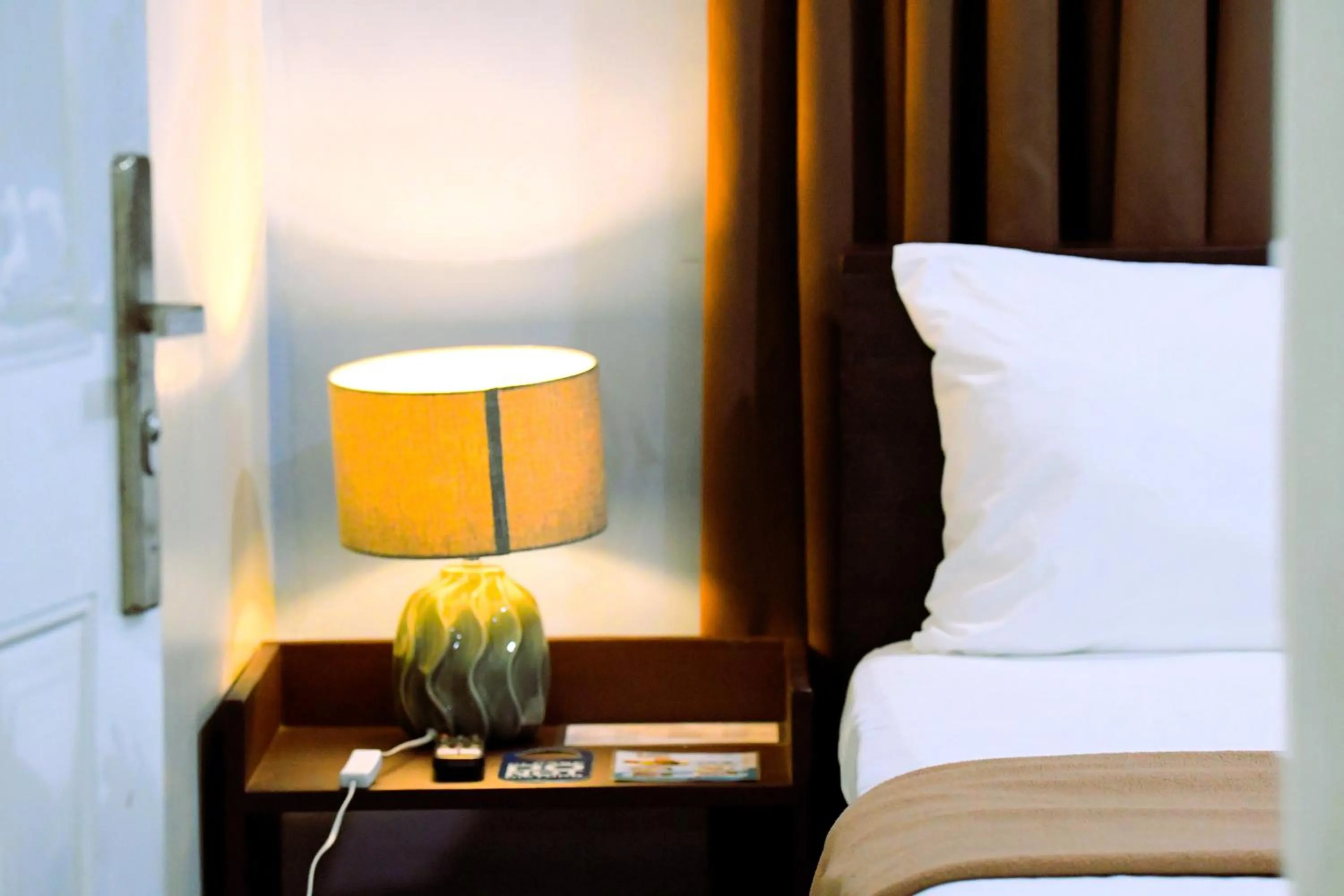 Bed in Arzo Hotel Makati