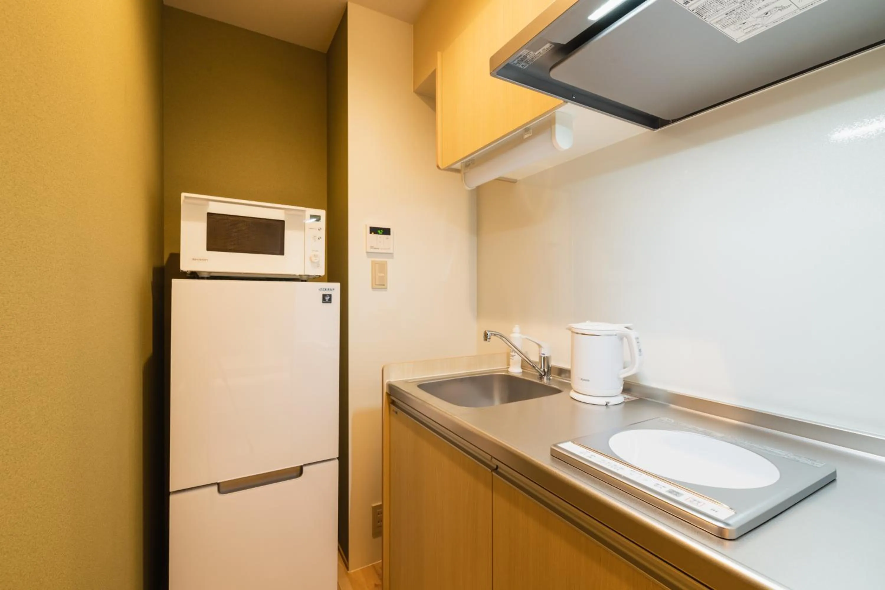 Kitchen or kitchenette in GRAND BASE Nagasaki Nakamachi