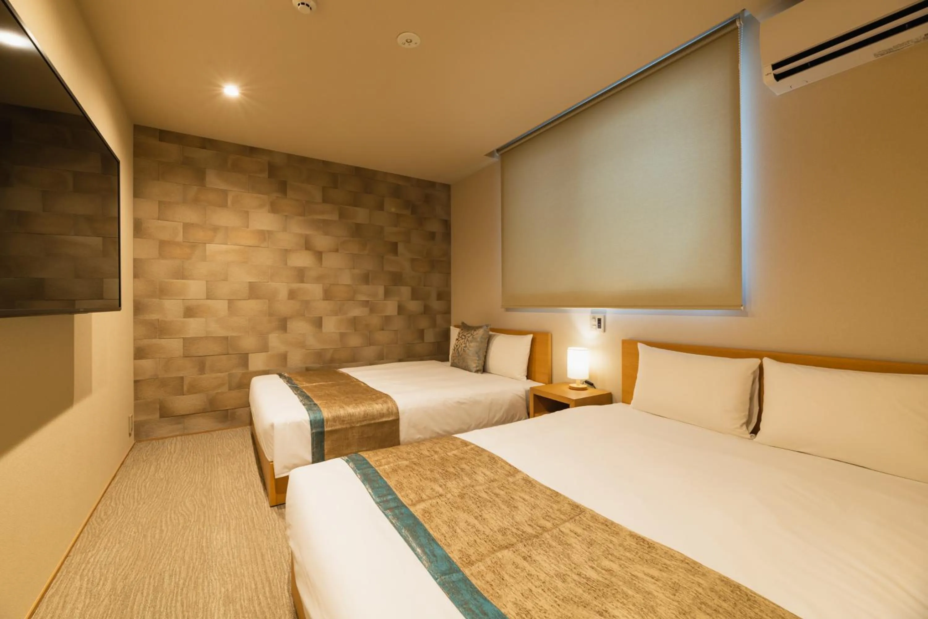 Photo of the whole room, Bed in GRAND BASE Nagasaki Nakamachi