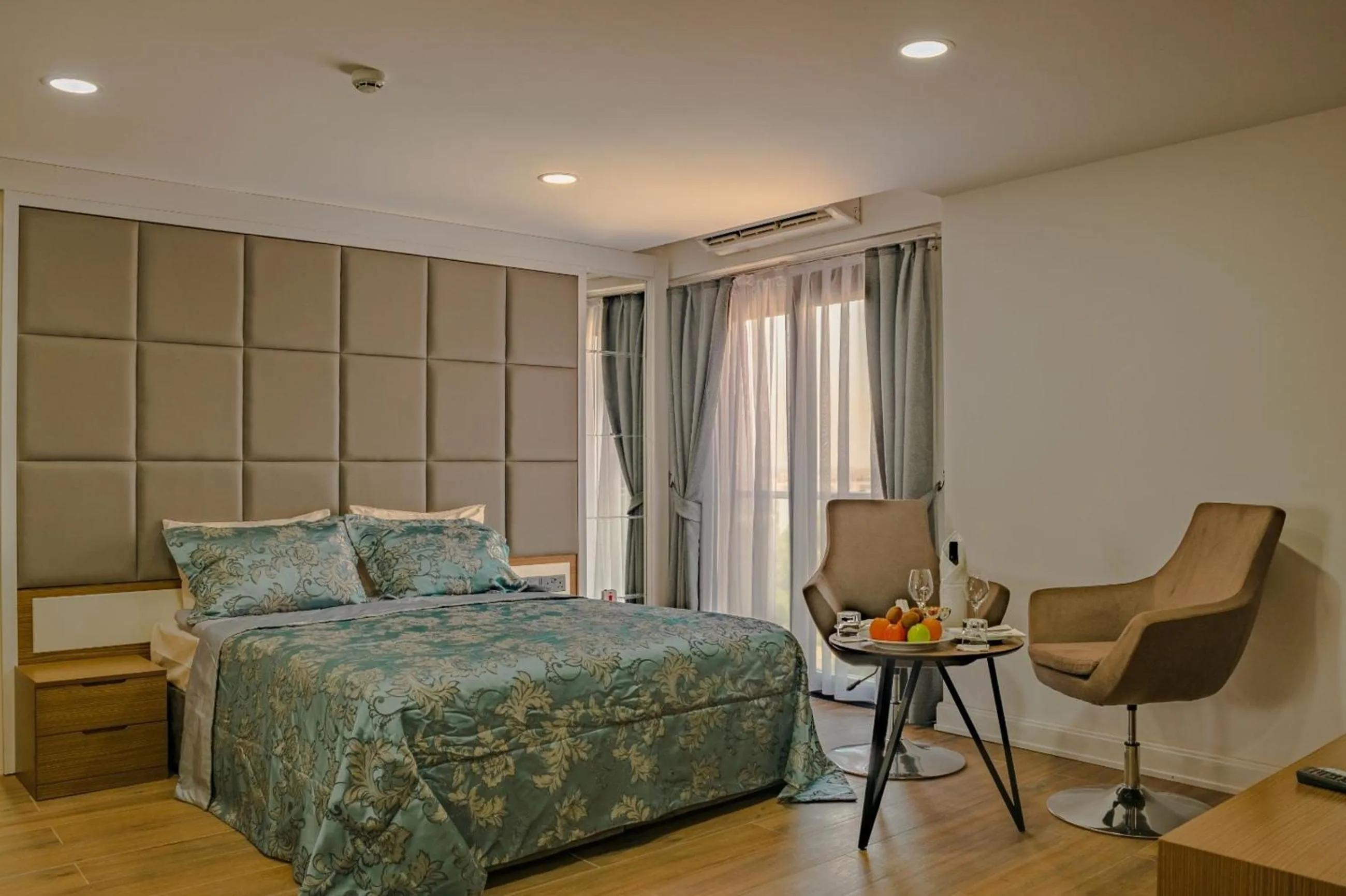 Bed in Novel Centre Point Hotel