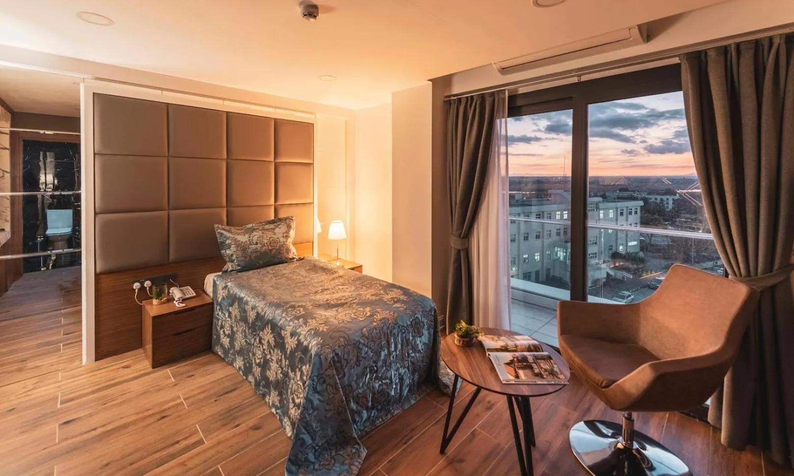 Bed in Novel Centre Point Hotel