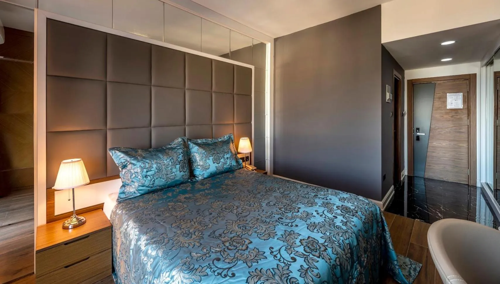 Bed in Novel Centre Point Hotel