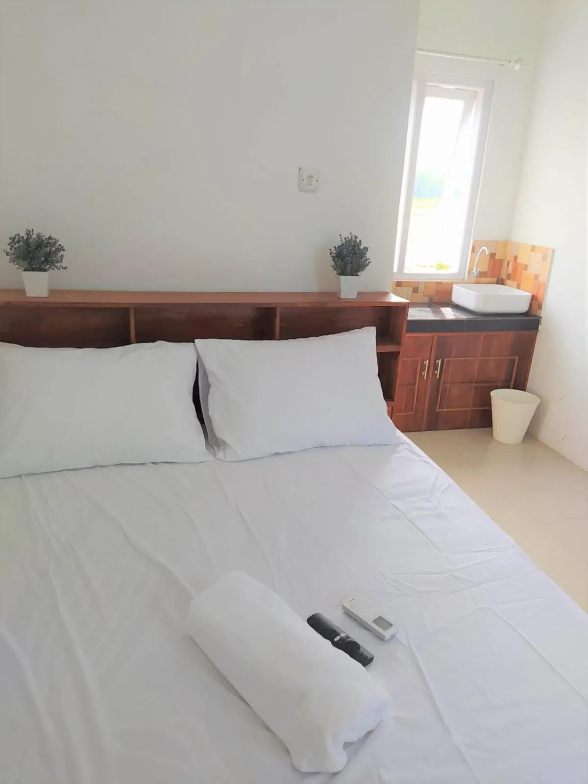 Bed in Guesthouse Berlian Batang Syariah near Kampung Kalisalak Park