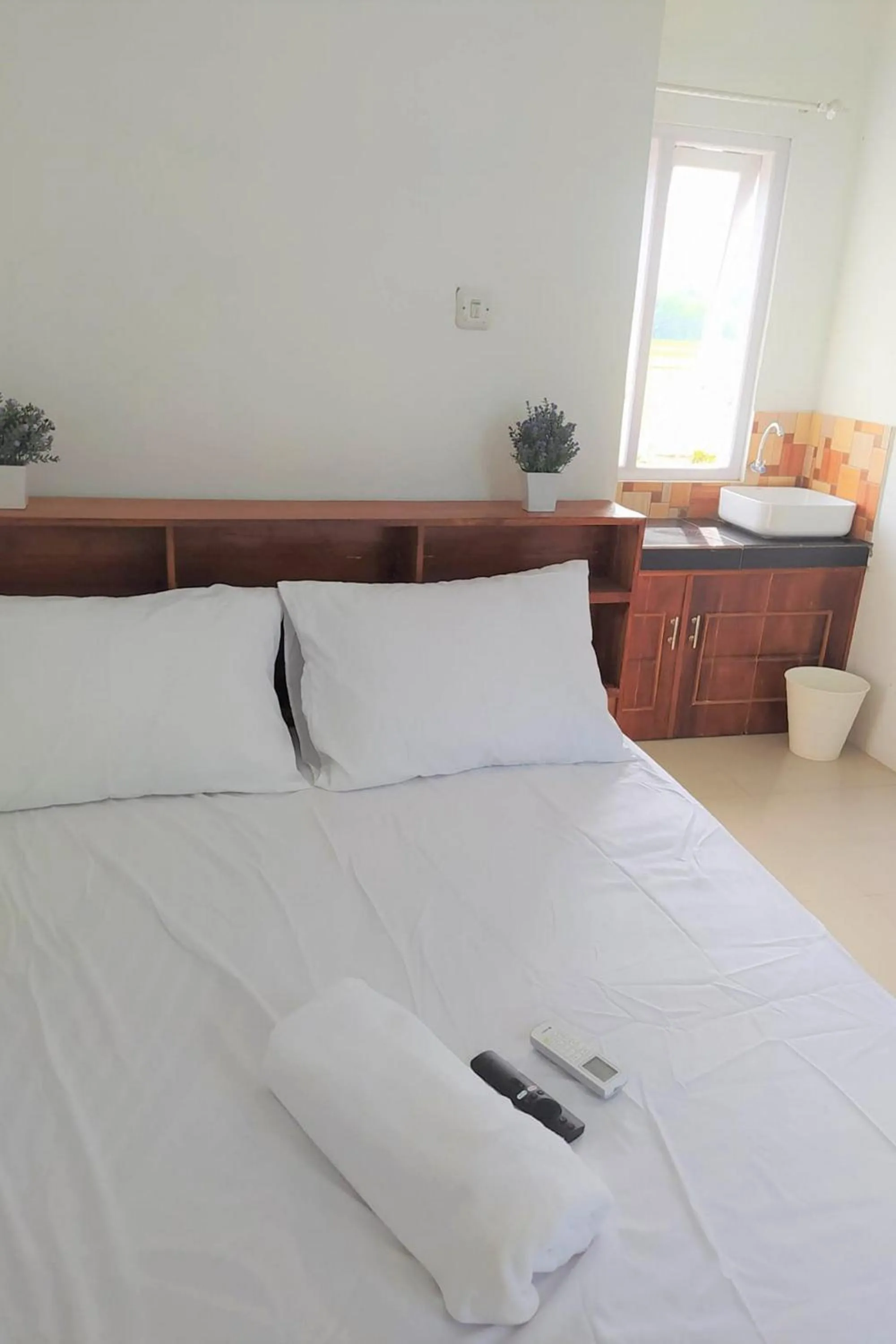 Bed in Guesthouse Berlian Batang Syariah near Kampung Kalisalak Park